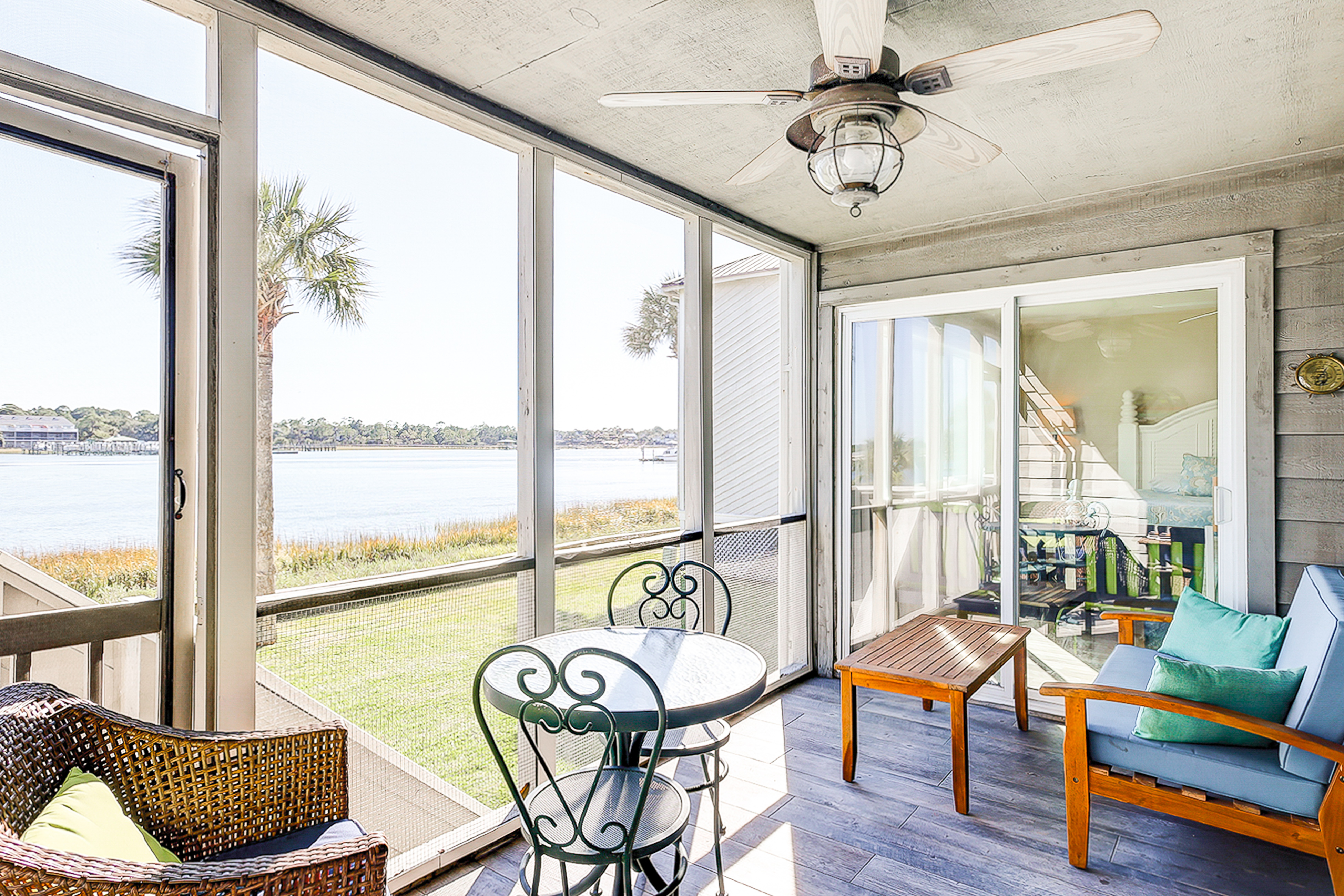 Riverfront condo with pool, 2 tennis courts, & screened porch - near beach