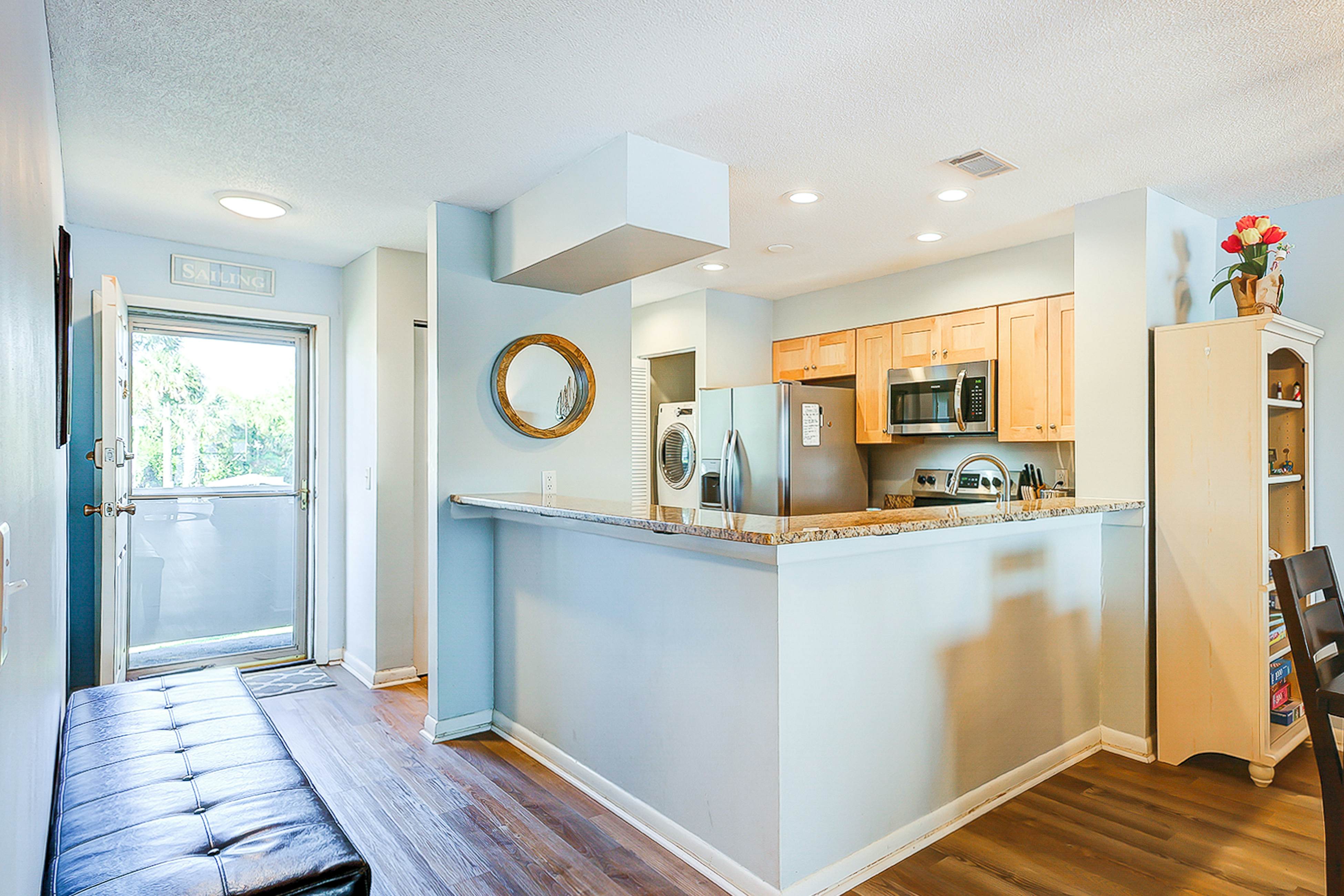 Riverfront condo with pool, 2 tennis courts, & screened porch - near beach