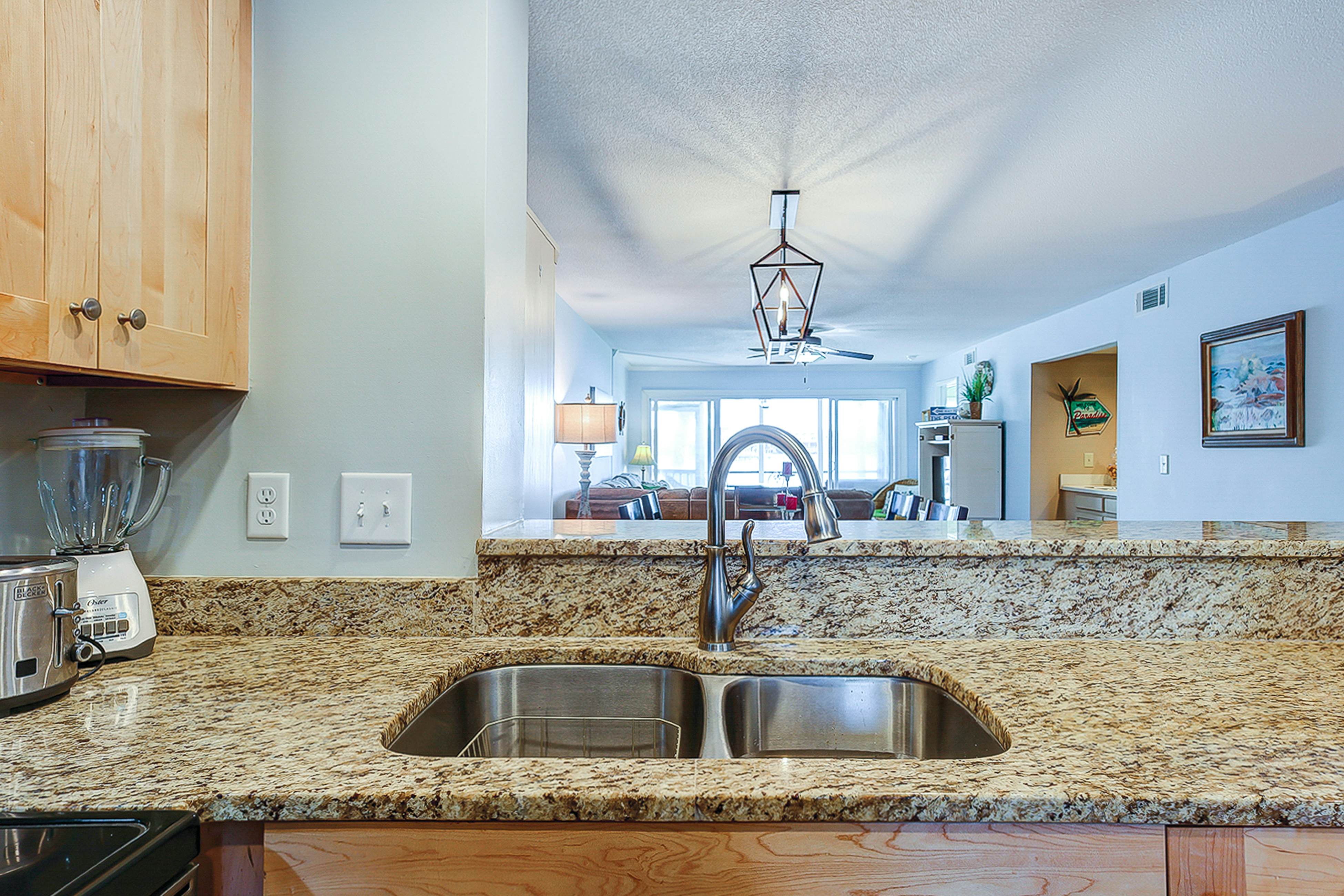 Riverfront condo with pool, 2 tennis courts, & screened porch - near beach