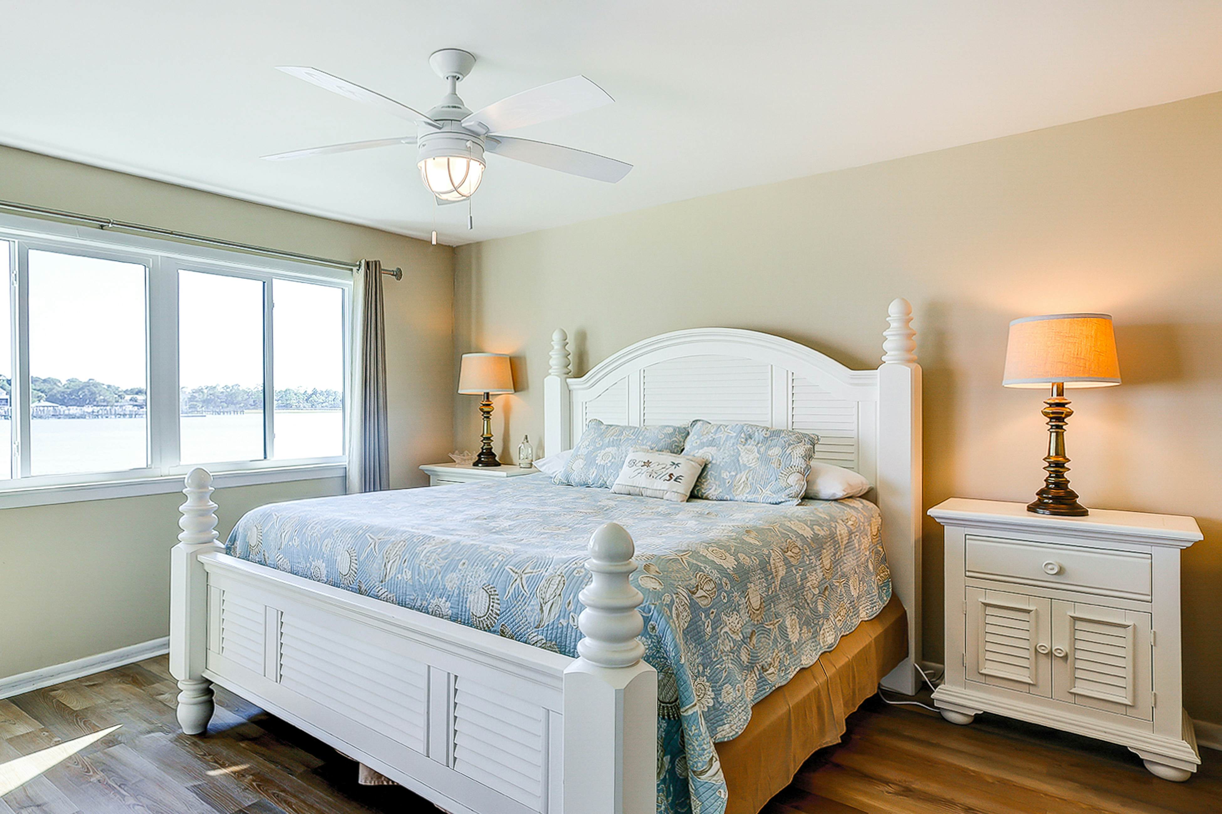 Riverfront condo with pool, 2 tennis courts, & screened porch - near beach