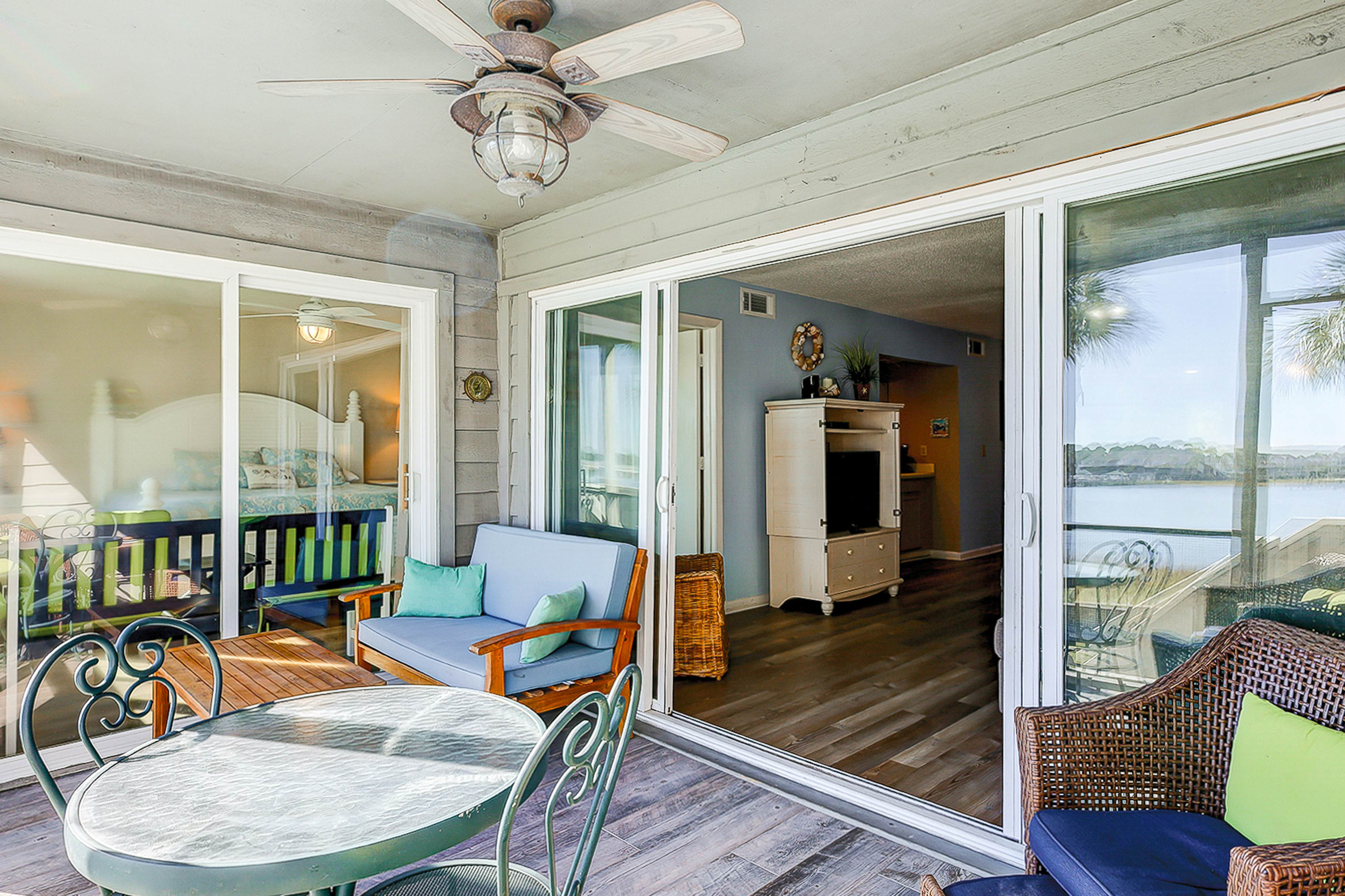 Riverfront condo with pool, 2 tennis courts, & screened porch - near beach