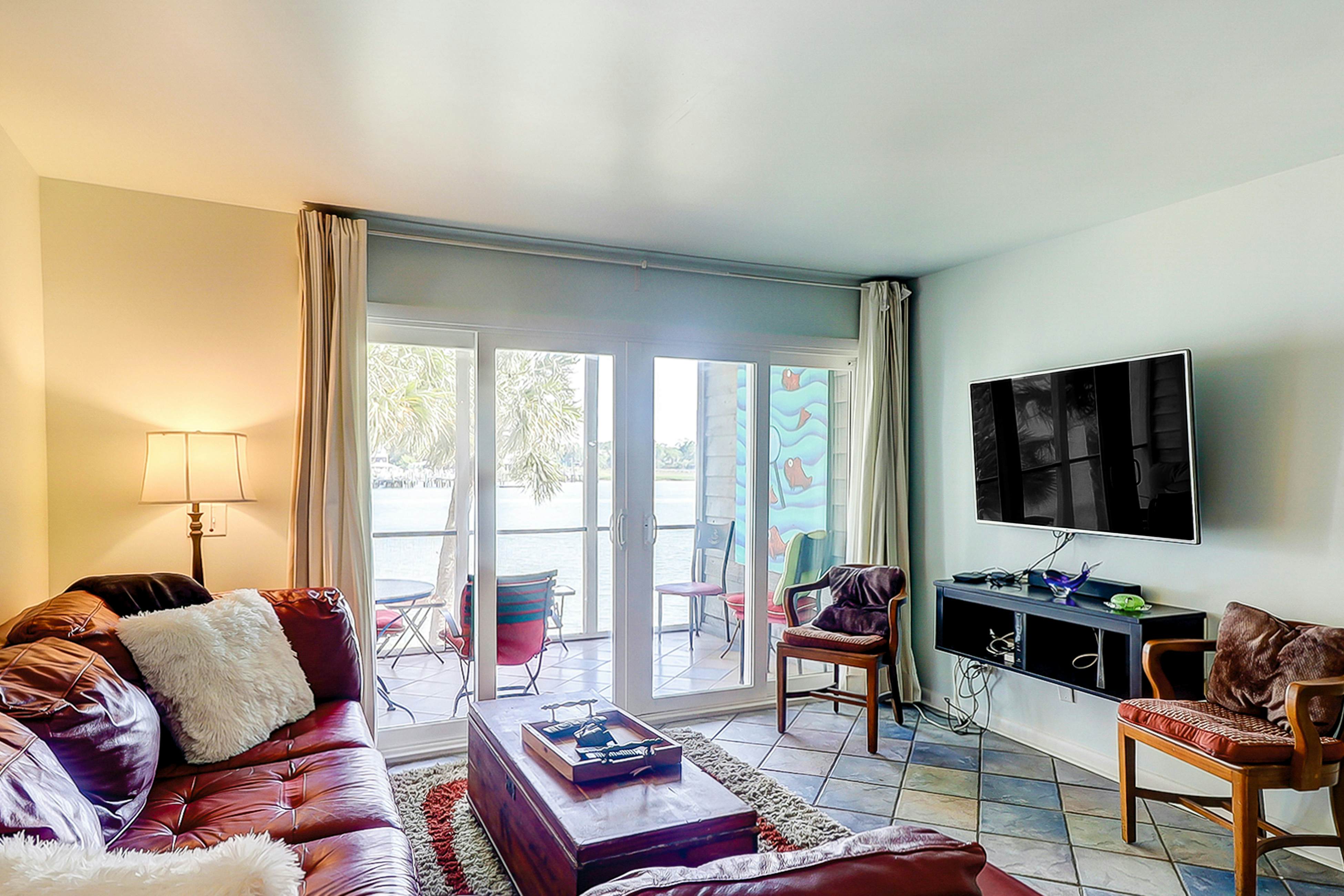 Lovely waterfront condo with balcony, central AC, & washer/dryer