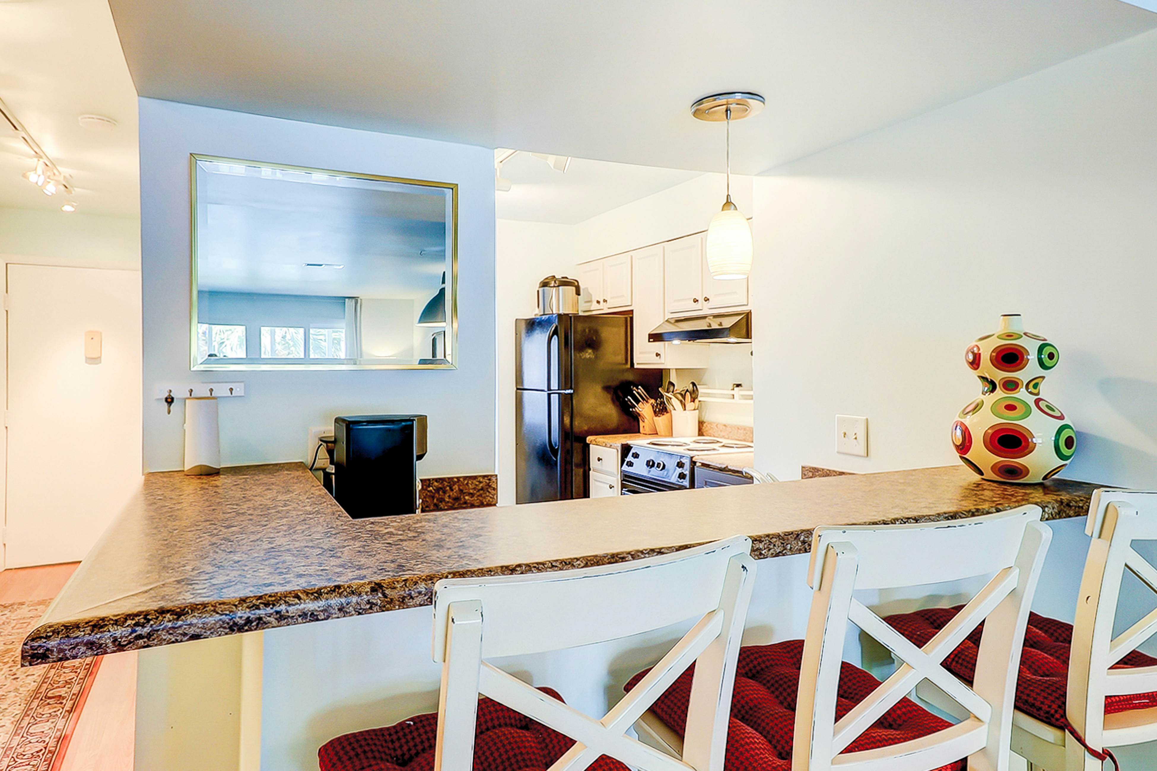 Lovely waterfront condo with balcony, central AC, & washer/dryer