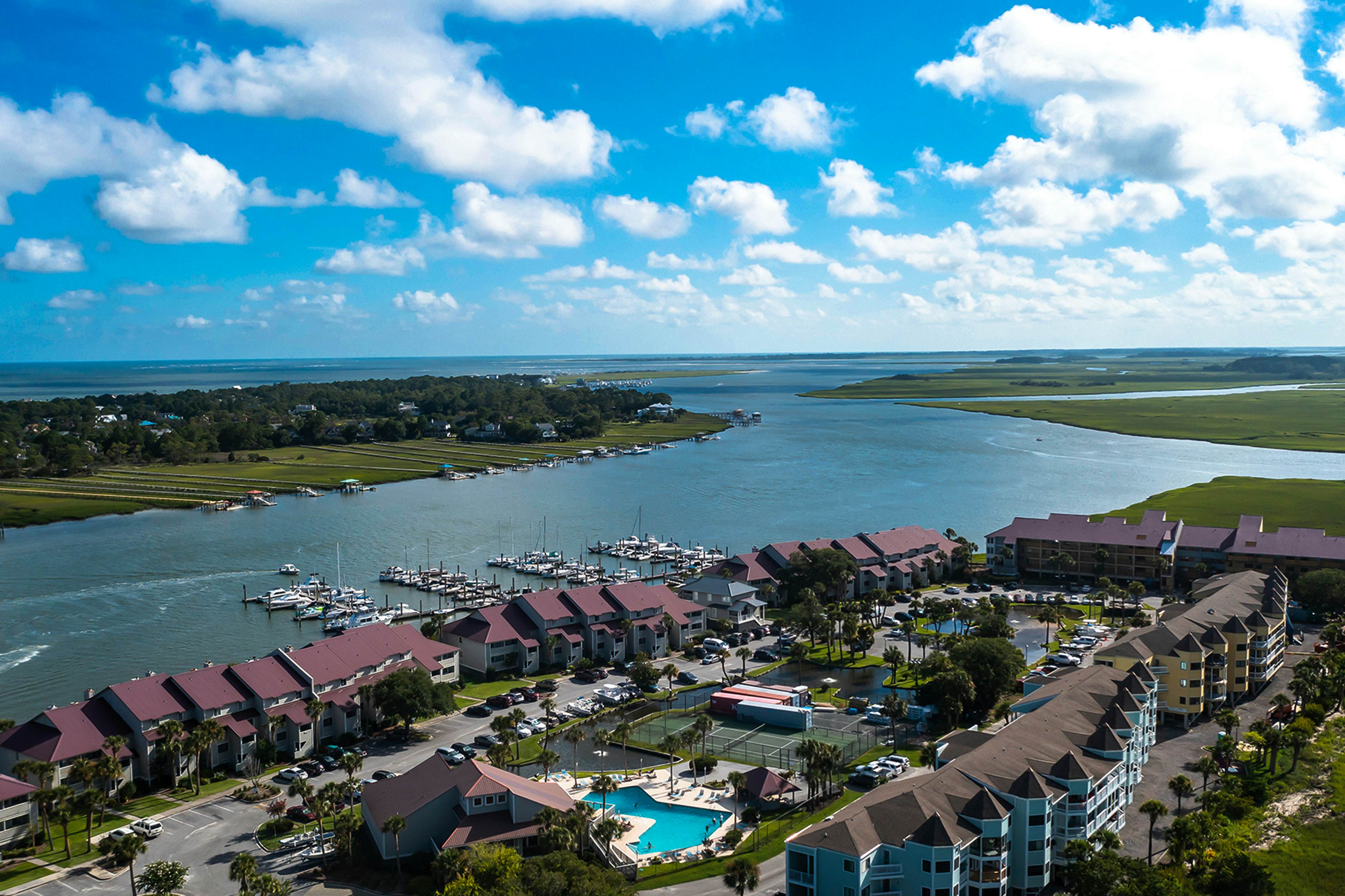 Riverfront condo near Folly Beach with balcony, views, outdoor pool & tennis