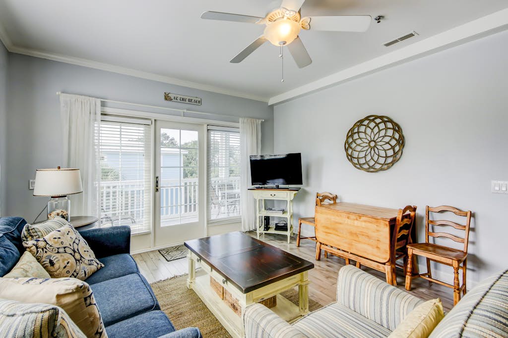 Fantastic condo with water-view, pool, balcony, central AC, & washer/dryer