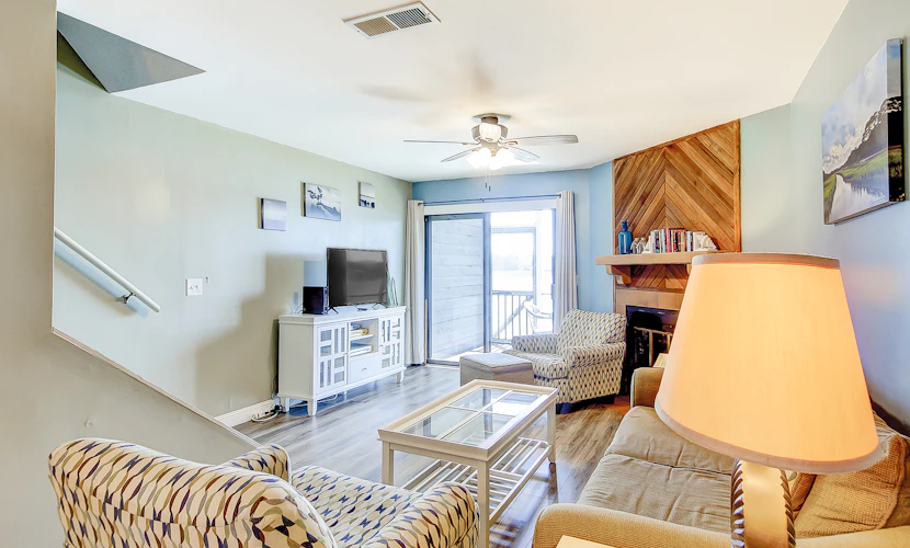 2-story riverfront condo with 2 balconies, outdoor pool, grills, river views, AC