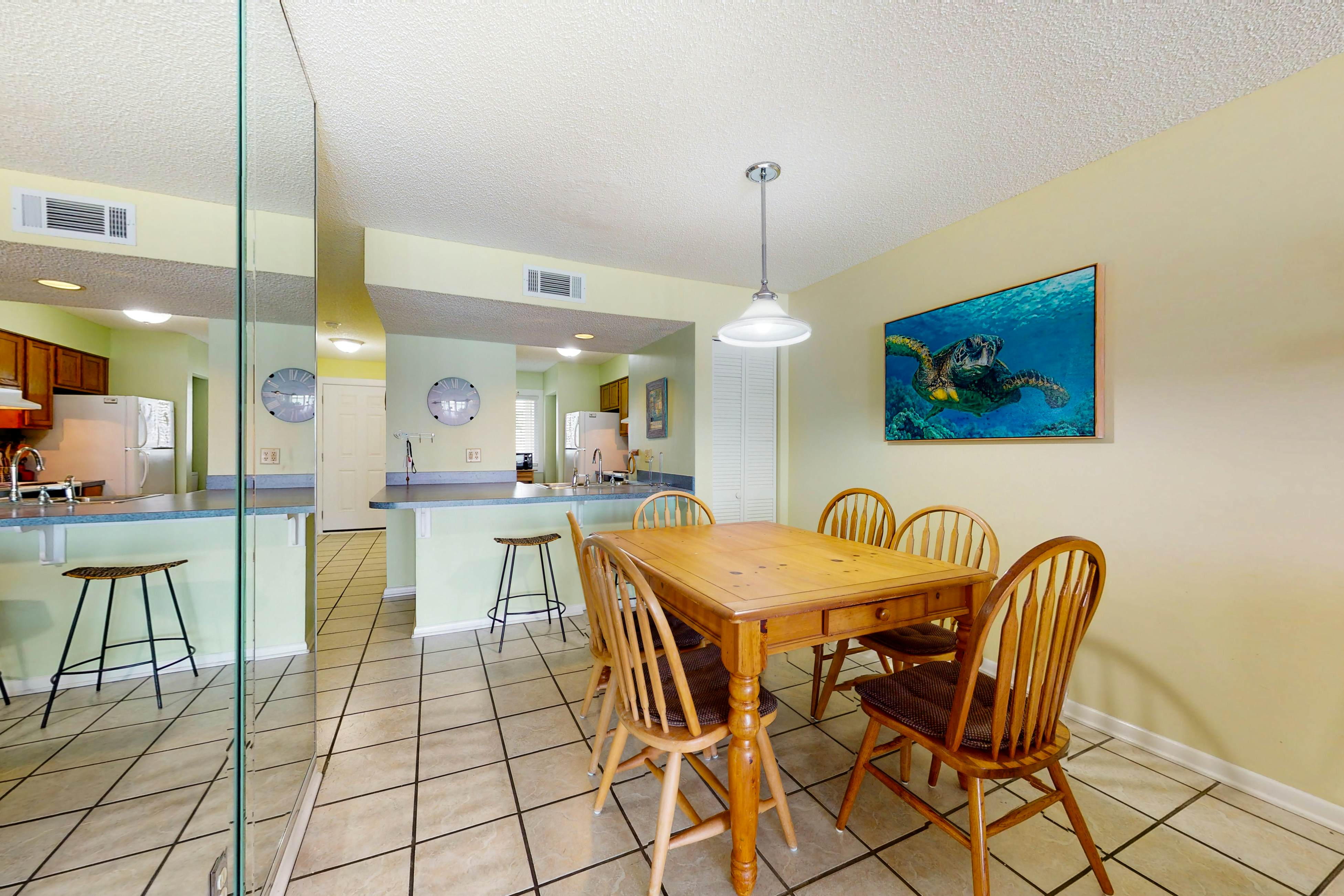 Waterfront condo with covered deck, amazing view, pool, & tennis courts