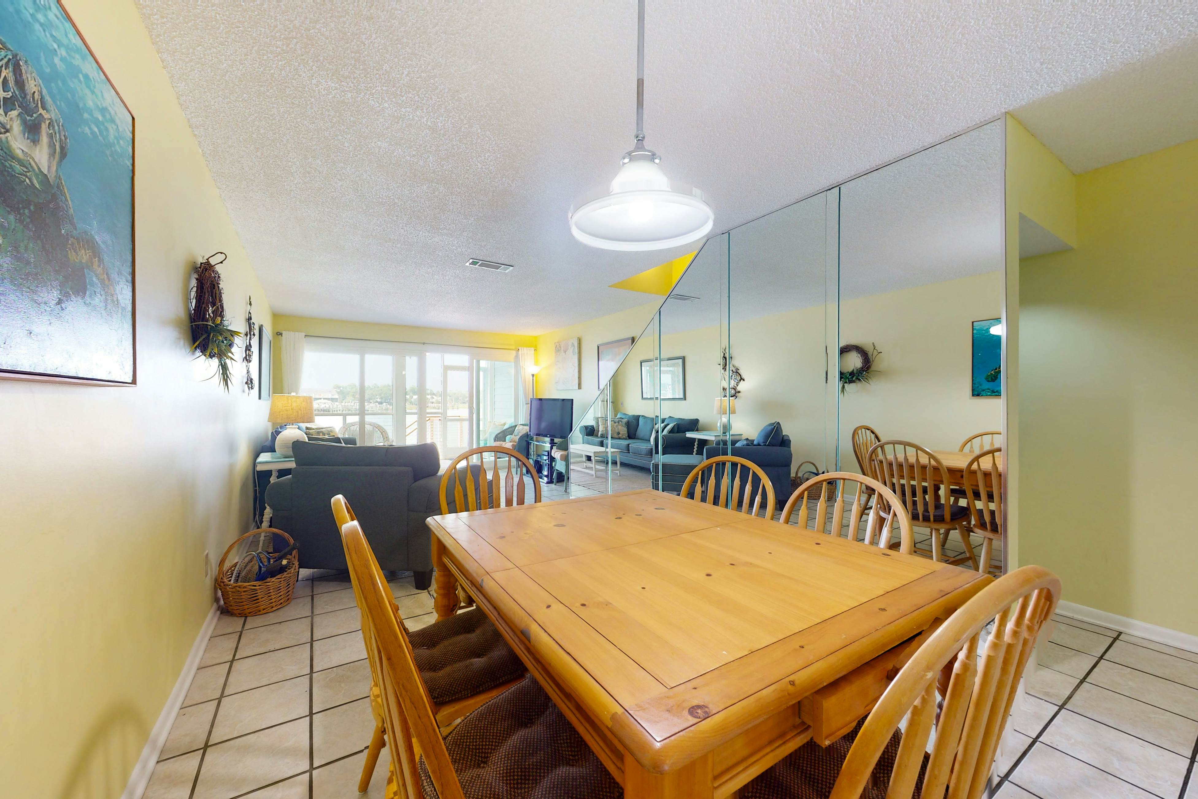 Waterfront condo with covered deck, amazing view, pool, & tennis courts