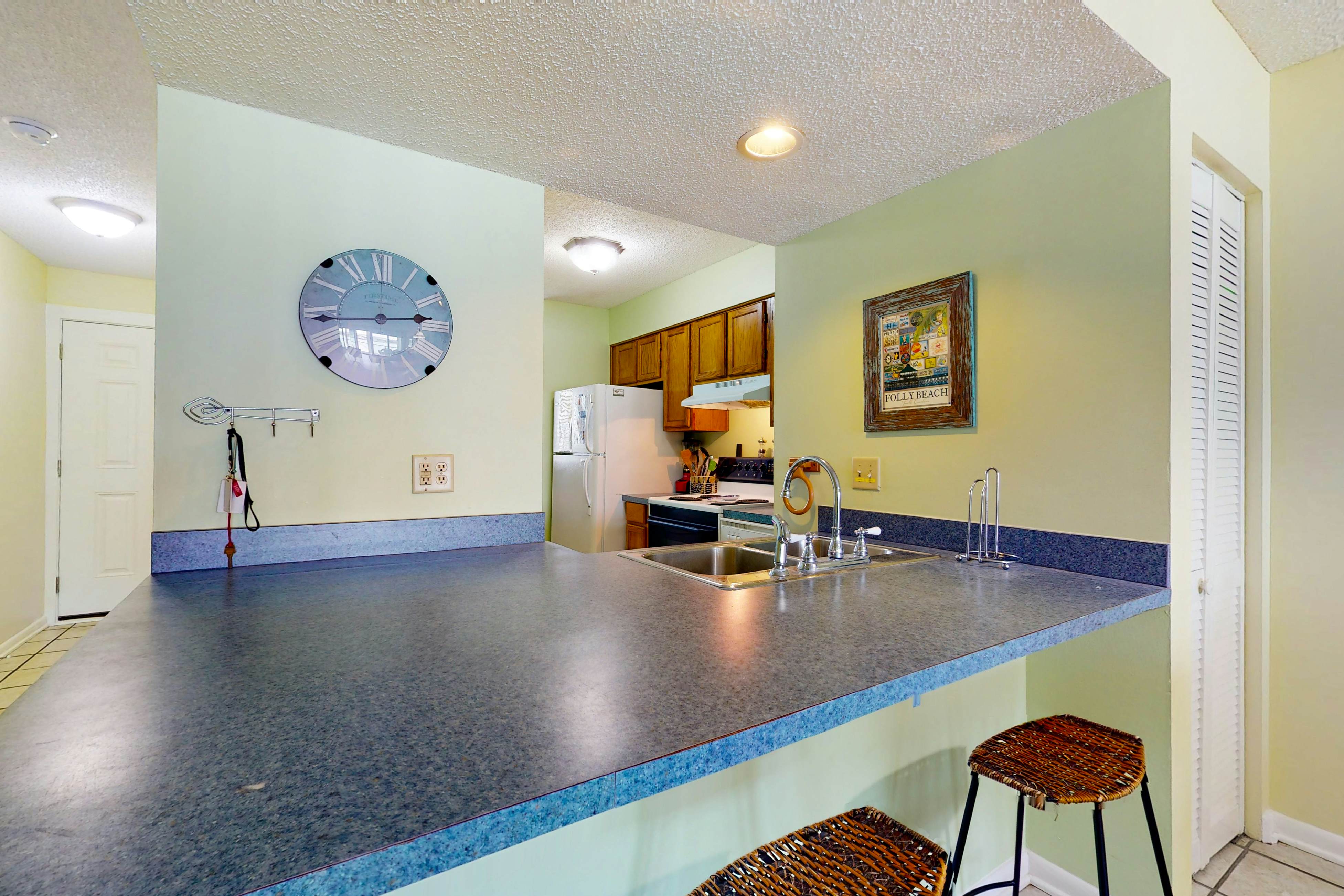 Waterfront condo with covered deck, amazing view, pool, & tennis courts