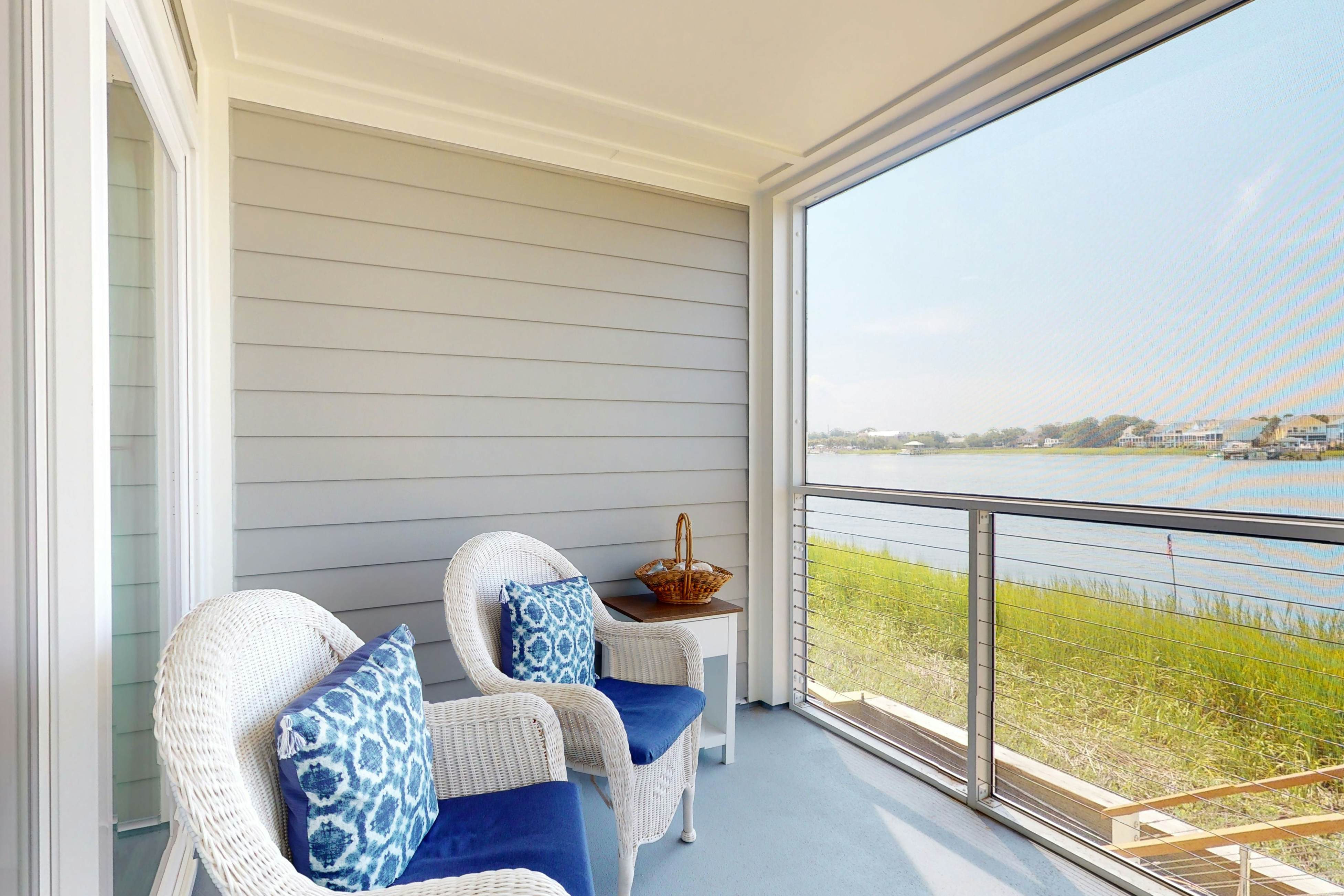 Waterfront condo with covered deck, amazing view, pool, & tennis courts