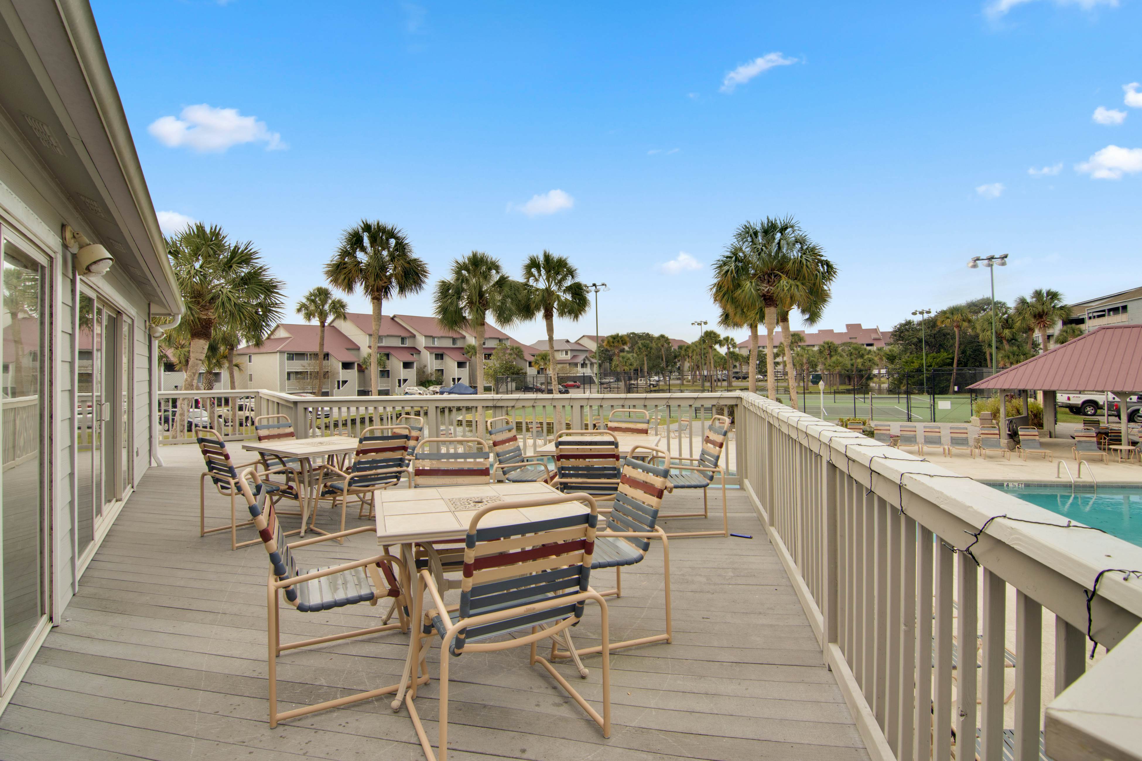 Waterfront condo with covered deck, amazing view, pool, & tennis courts