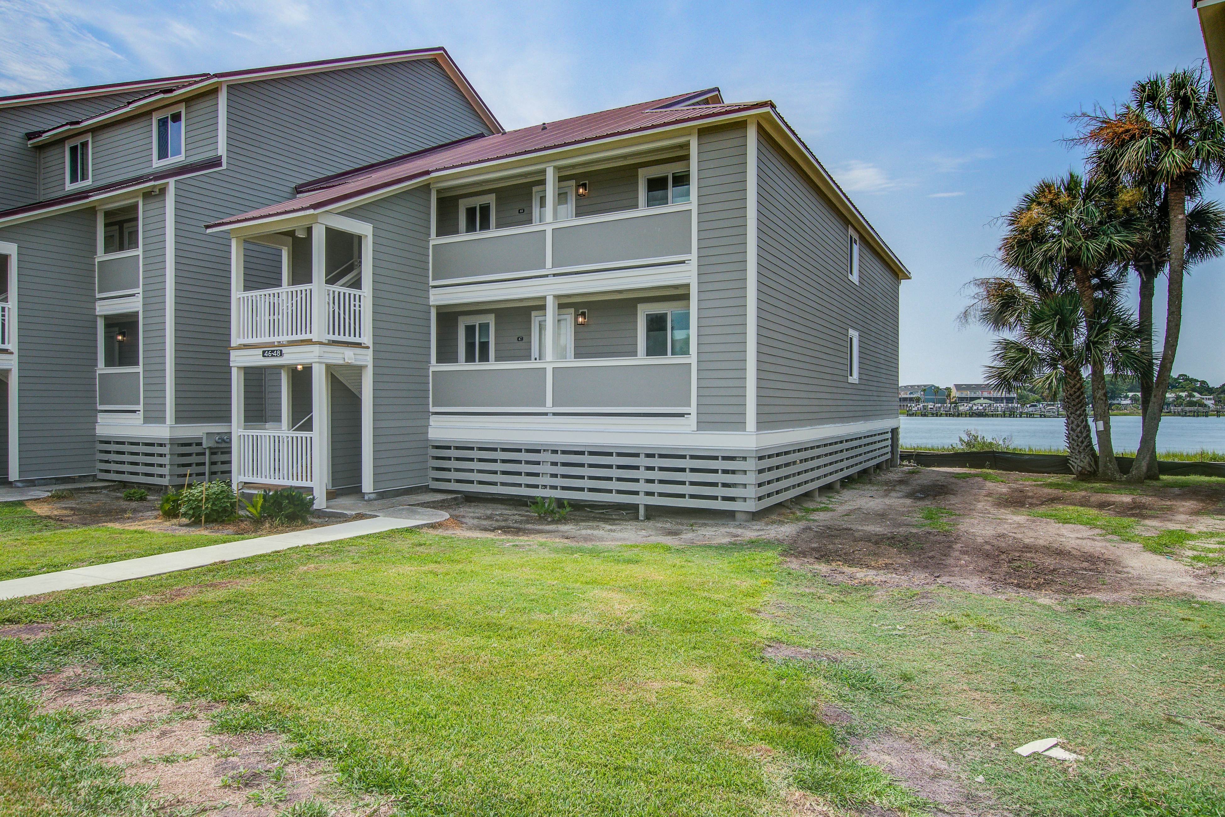 Waterfront condo with covered deck, amazing view, pool, & tennis courts