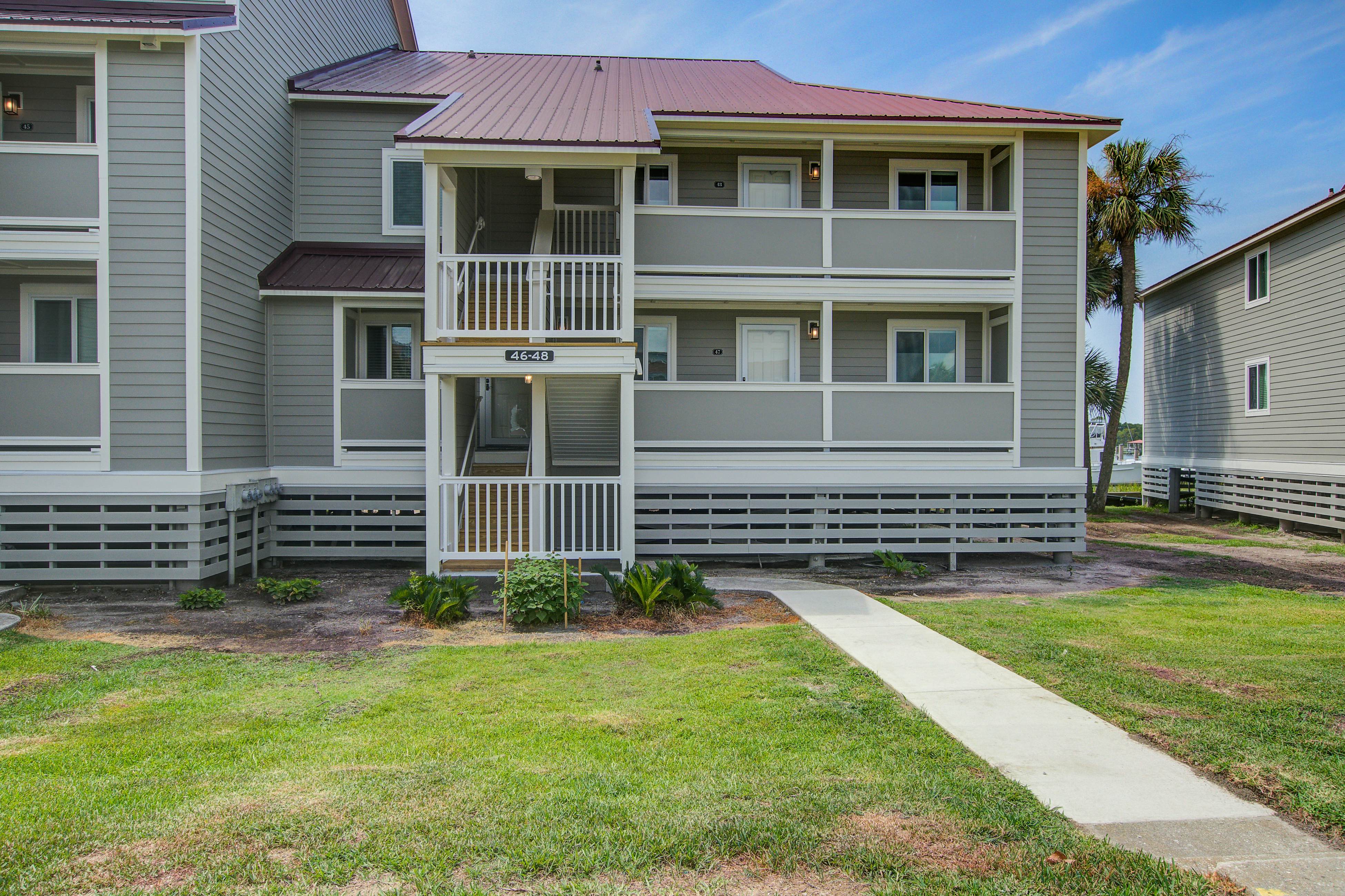 Waterfront condo with covered deck, amazing view, pool, & tennis courts