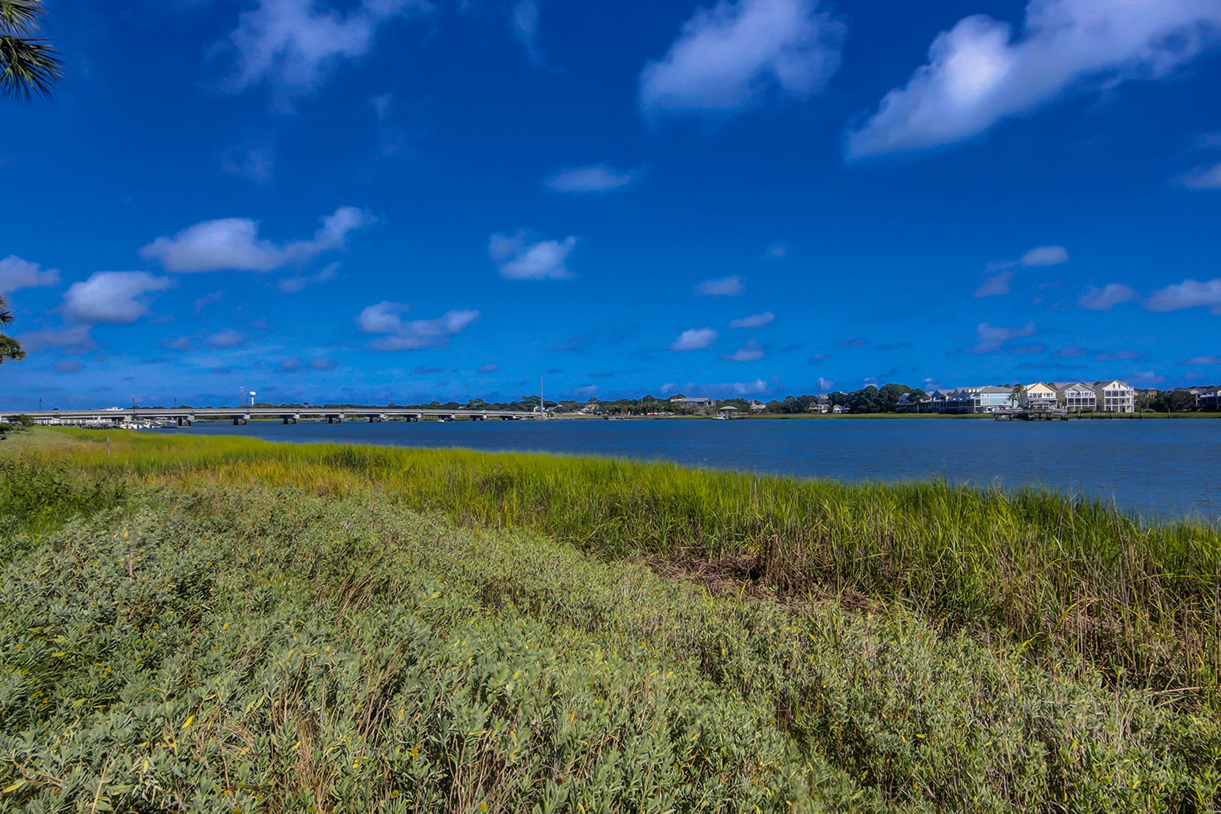 Waterfront condo with covered deck, amazing view, pool, & tennis courts