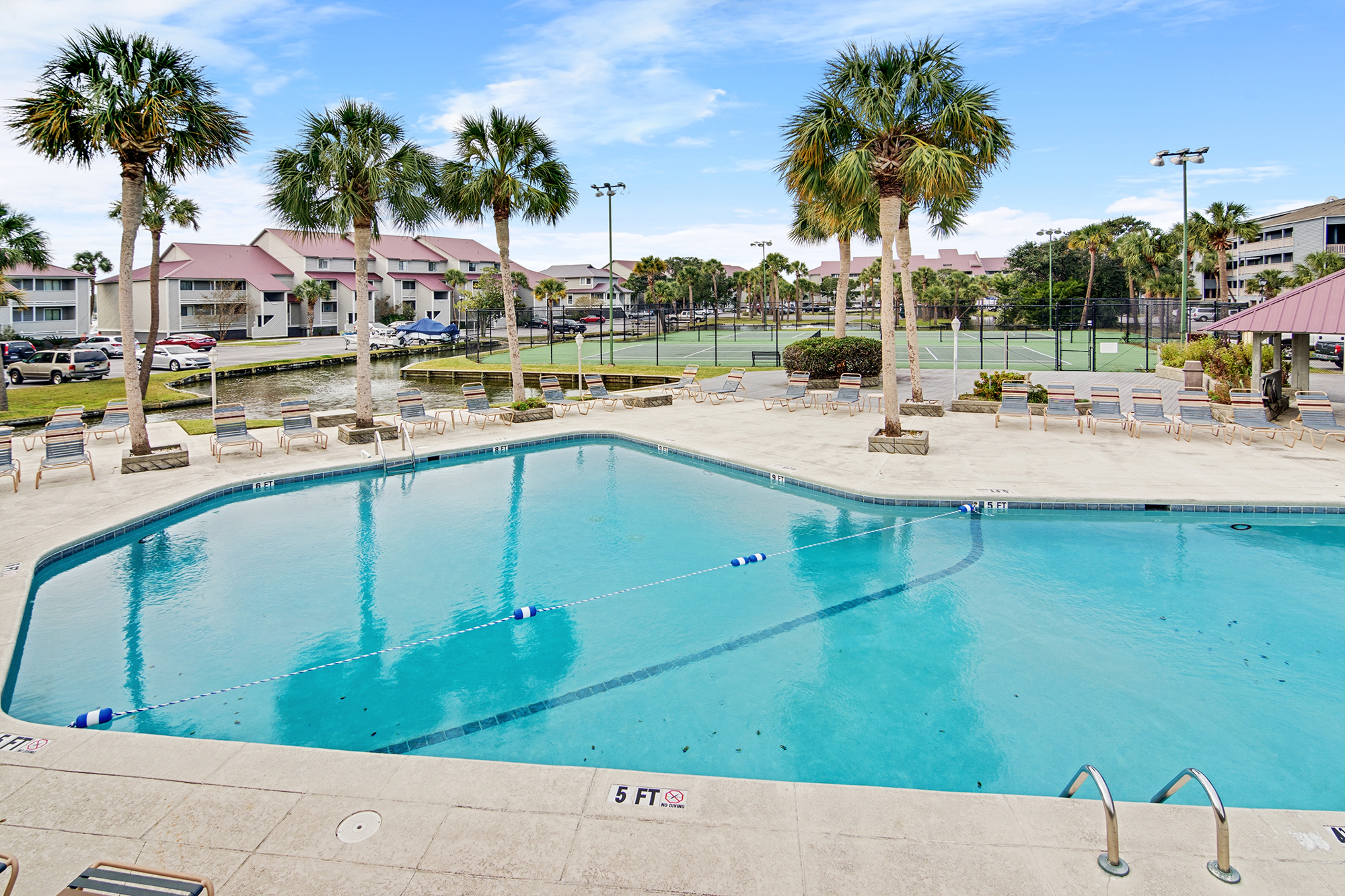 Marsh-view condo with on-site pool, tennis, & private balcony