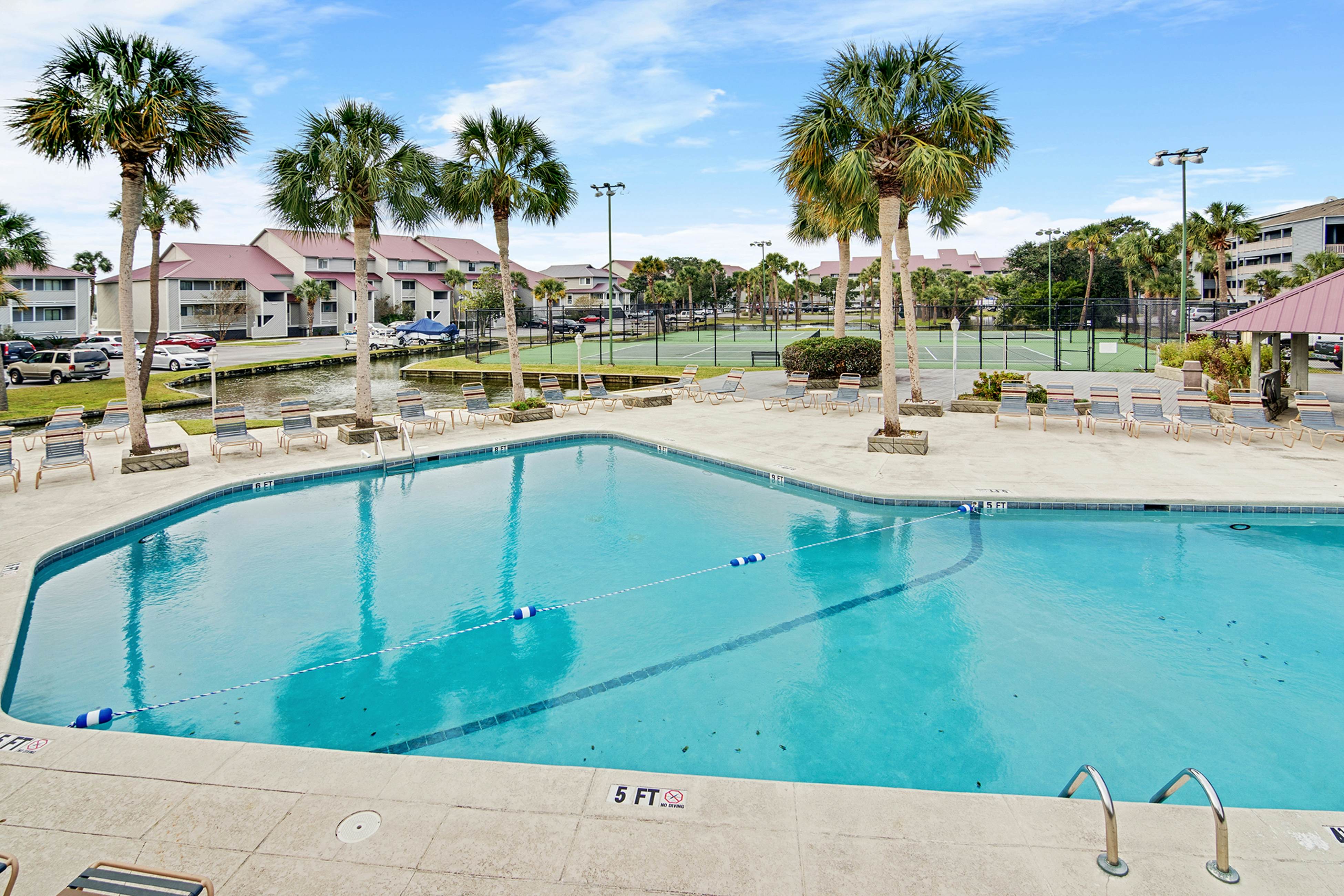 Marsh-view condo with on-site pool, tennis, & private balcony