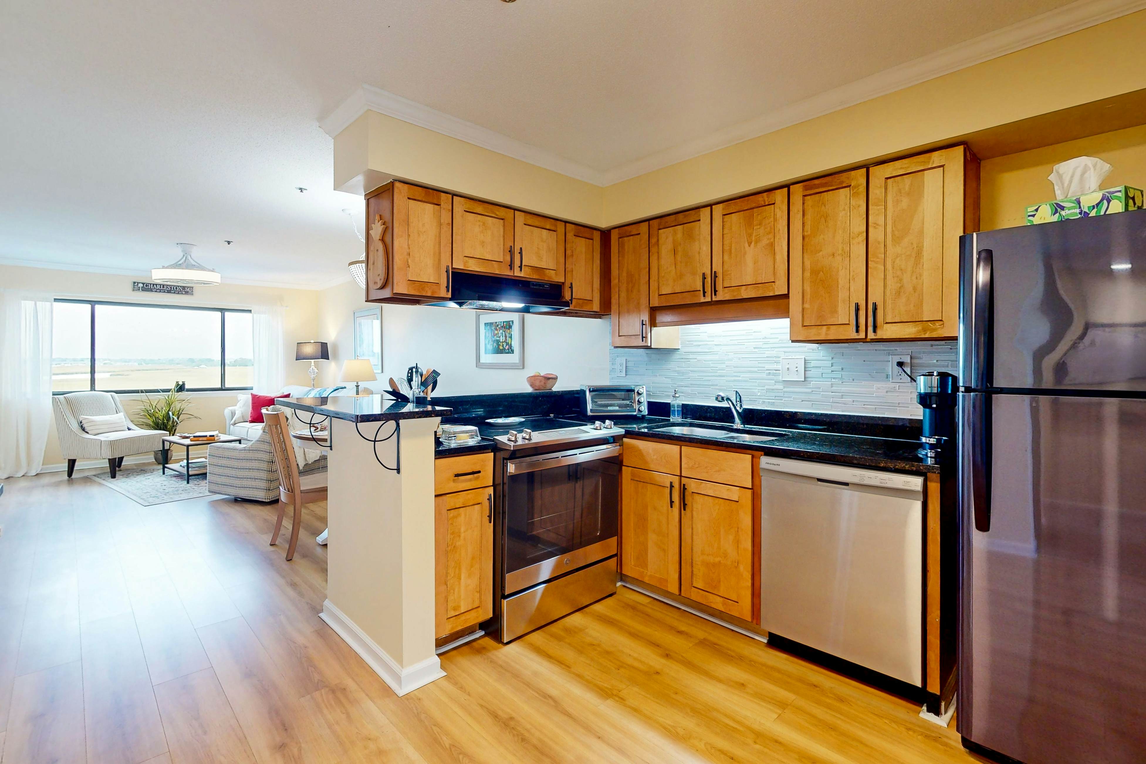 Marsh-view condo with on-site pool, tennis, & private balcony