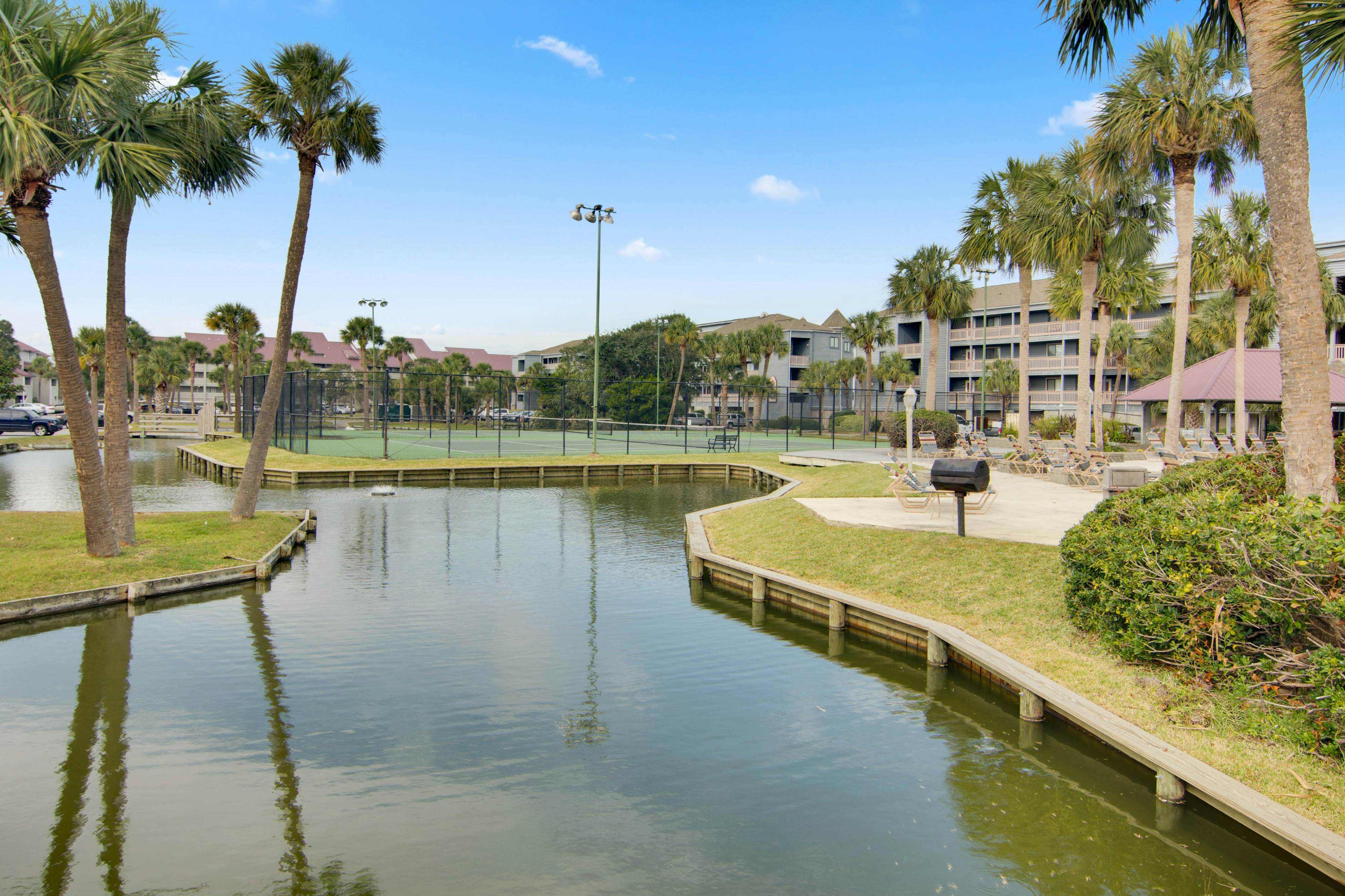 Marsh-view condo with on-site pool, tennis, & private balcony
