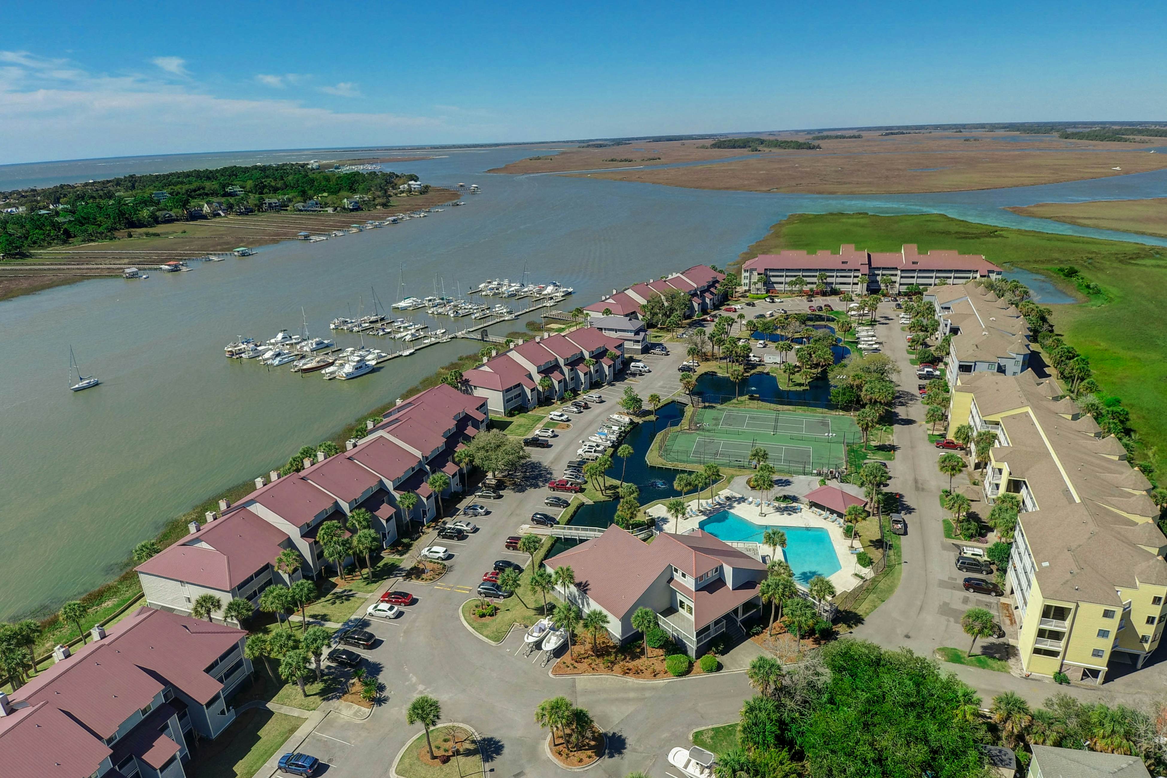 Marsh-view condo with on-site pool, tennis, & private balcony