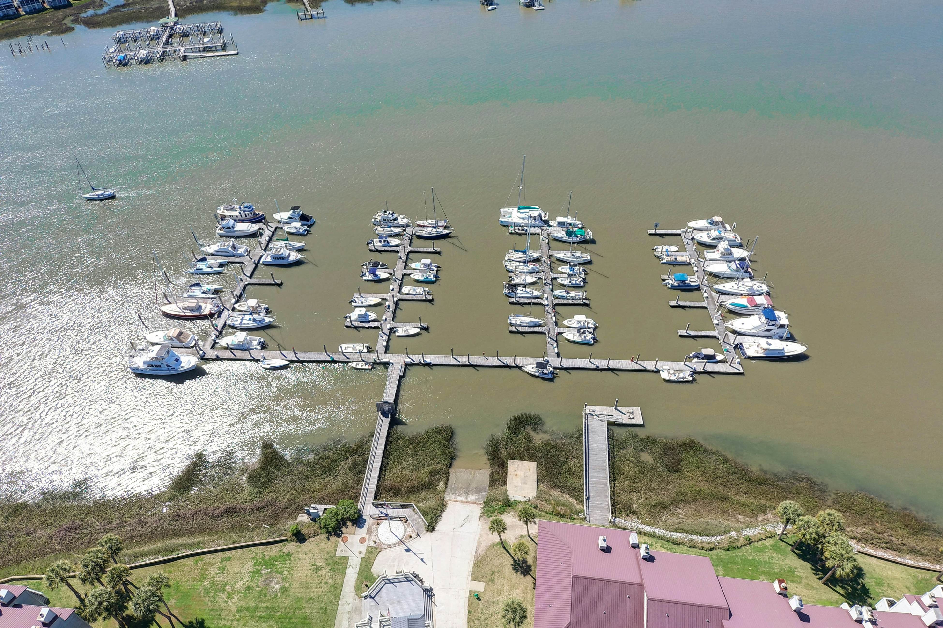 Marsh-view condo with on-site pool, tennis, & private balcony