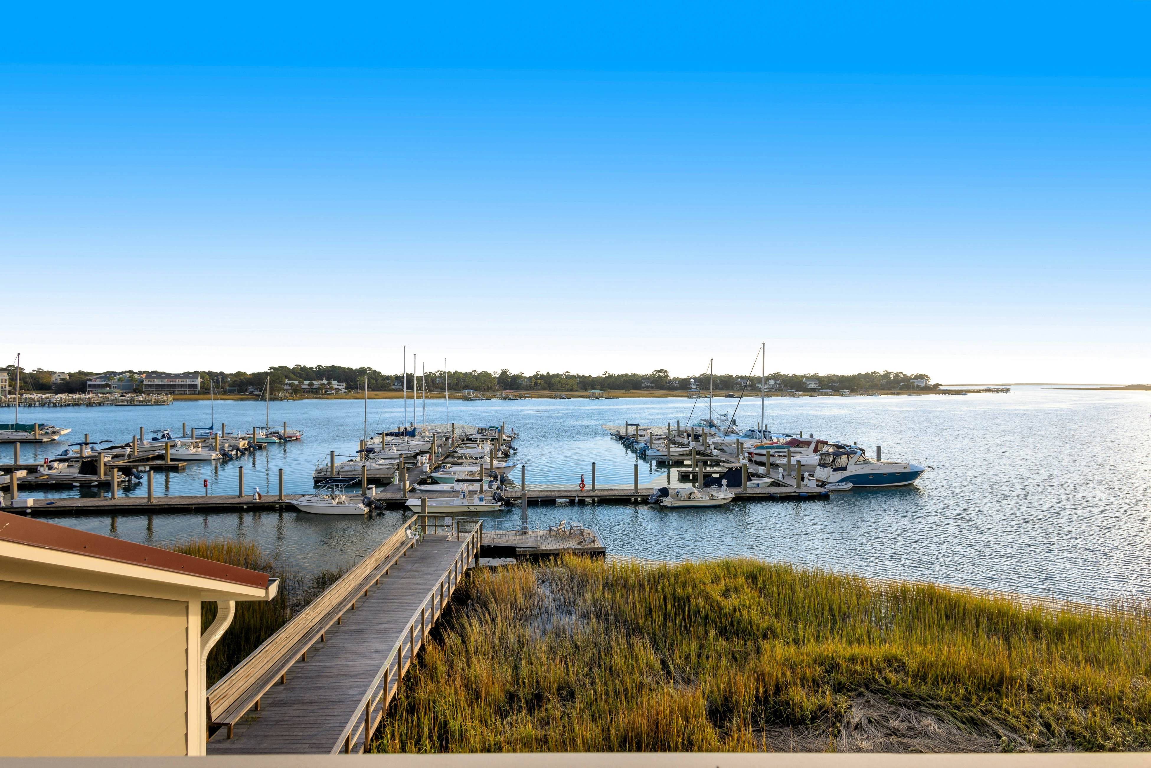 Waterfront gem with pool & amazing lanai view - near the beach, marina, & dining