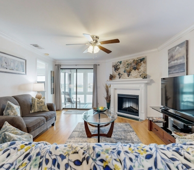 Elegant riverfront condo with access to private W/D, central AC, and pool access