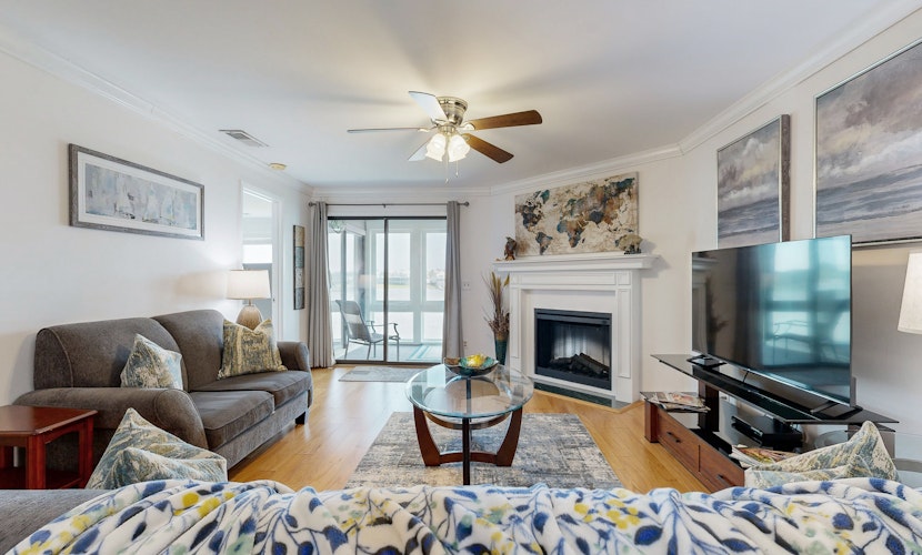 Elegant riverfront condo with access to private W/D, central AC, and pool access