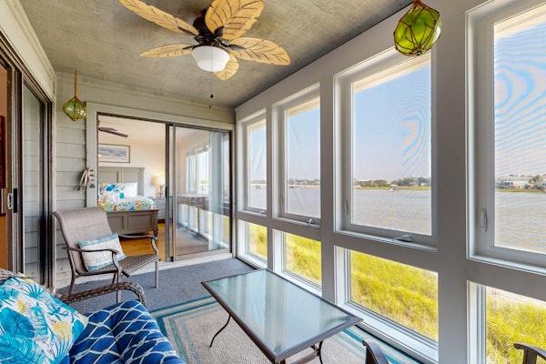 Elegant riverfront condo with access to private W/D, central AC, and pool access