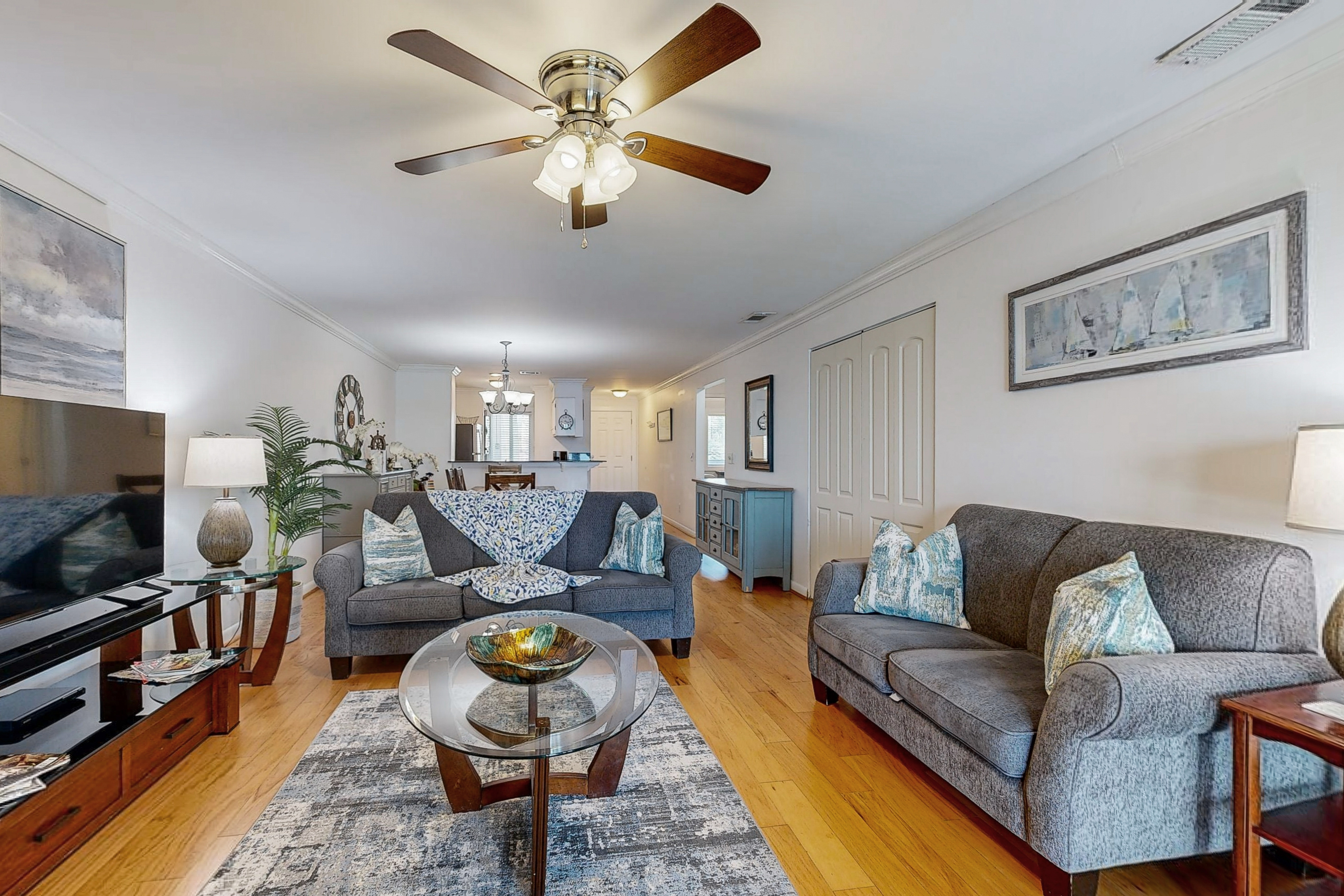 Elegant riverfront condo with access to private W/D, central AC, and pool access