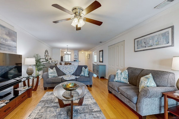 Elegant riverfront condo with access to private W/D, central AC, and pool access