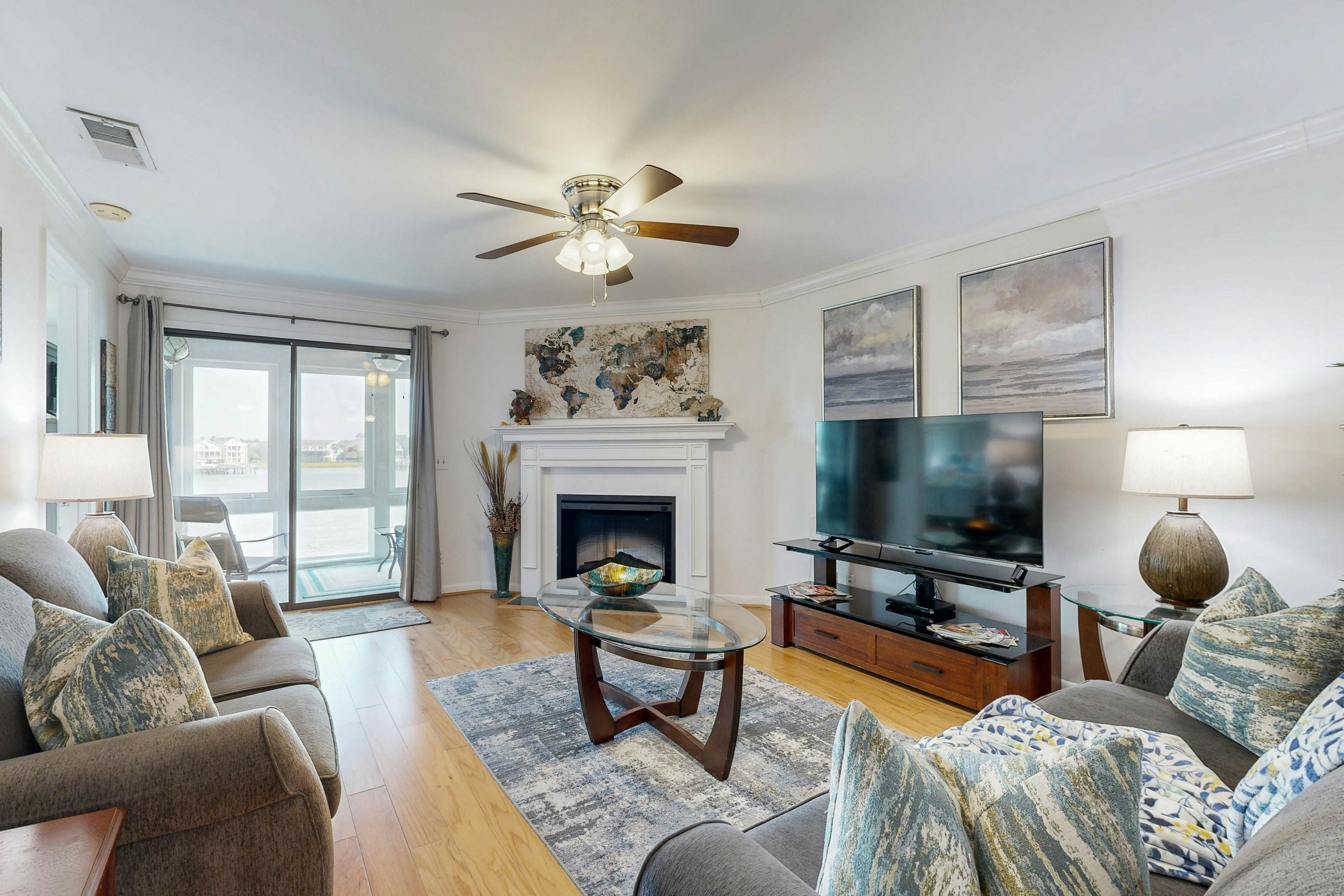 Elegant riverfront condo with access to private W/D, central AC, and pool access