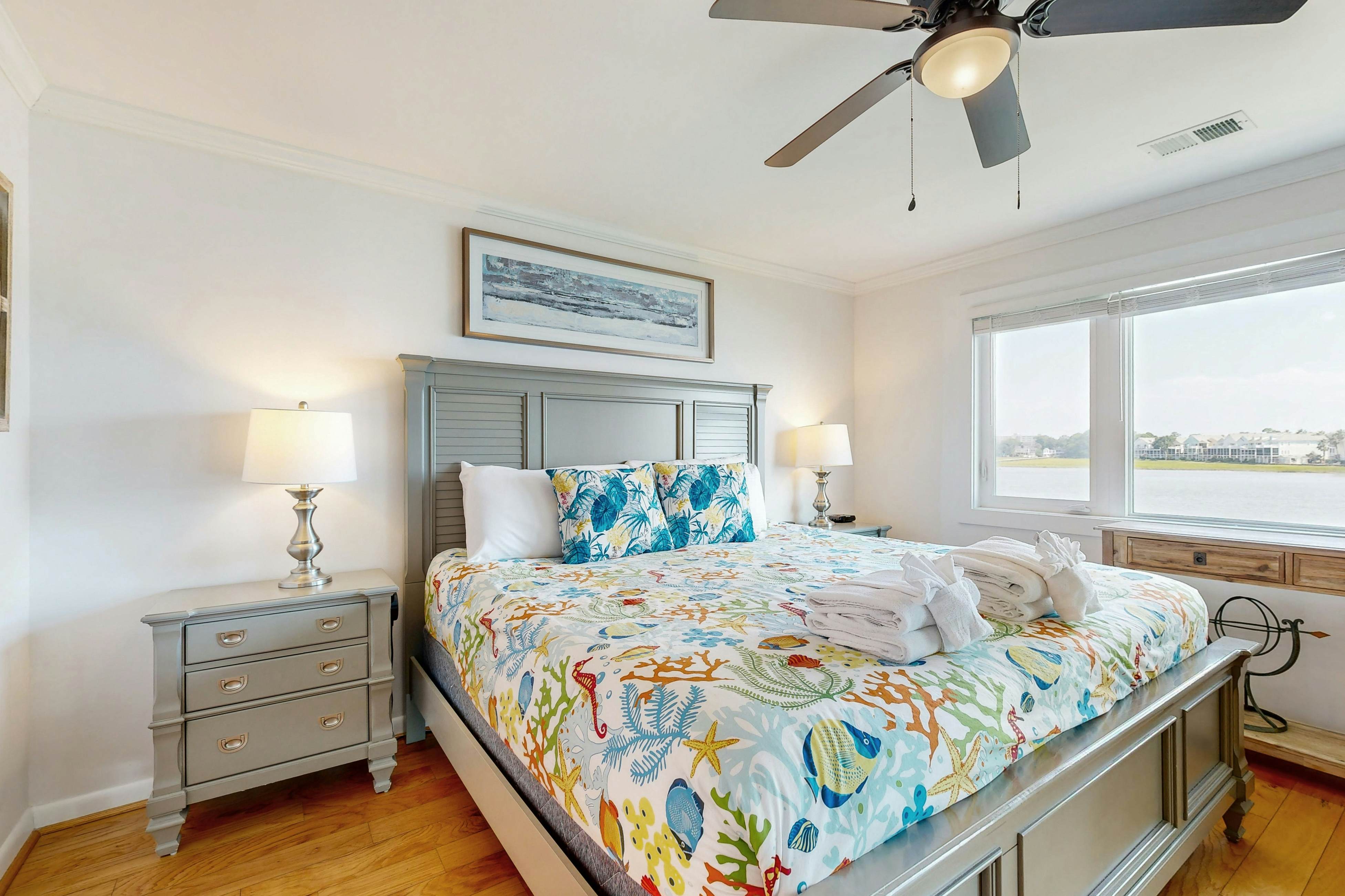 Elegant riverfront condo with access to private W/D, central AC, and pool access