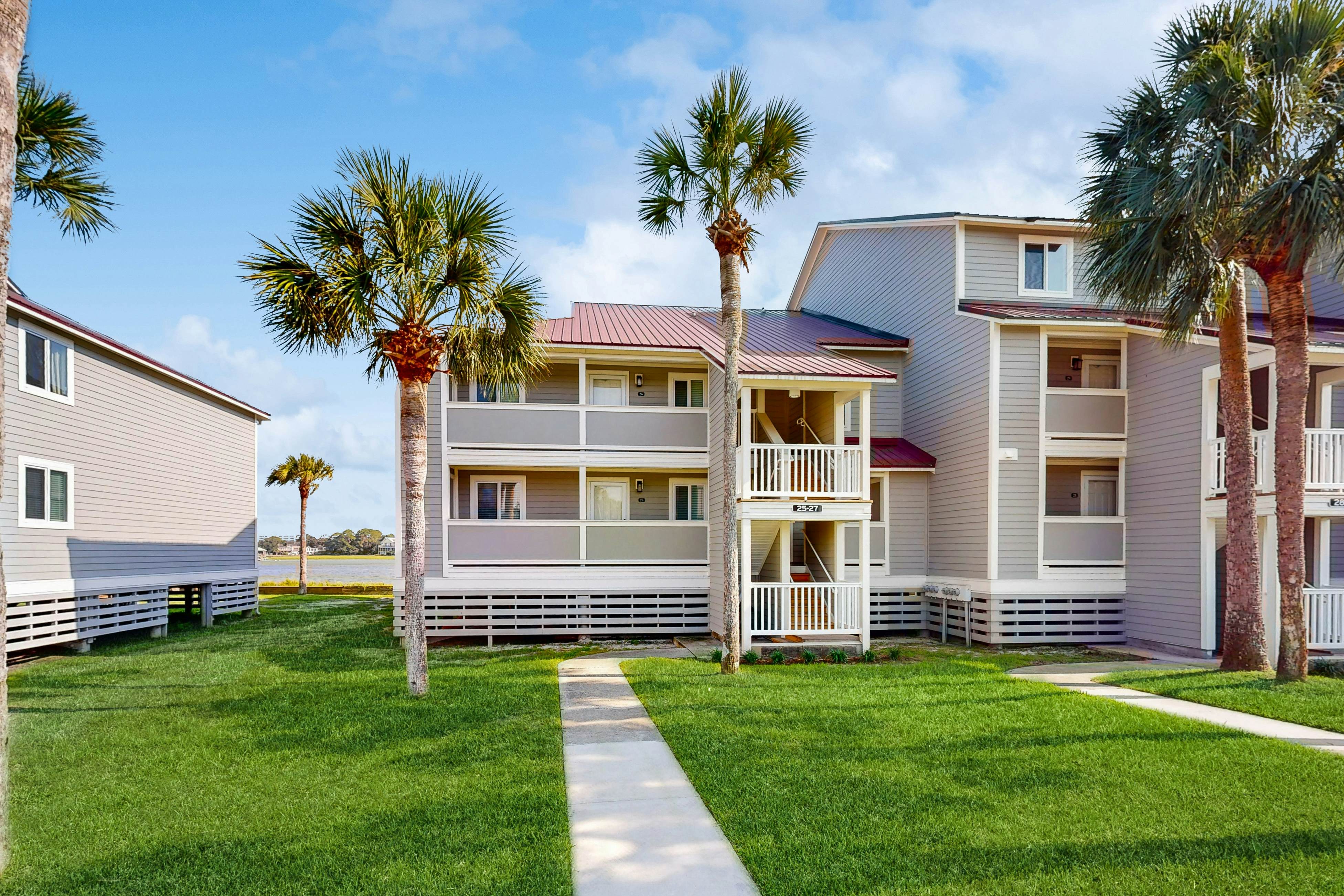 Elegant riverfront condo with access to private W/D, central AC, and pool access