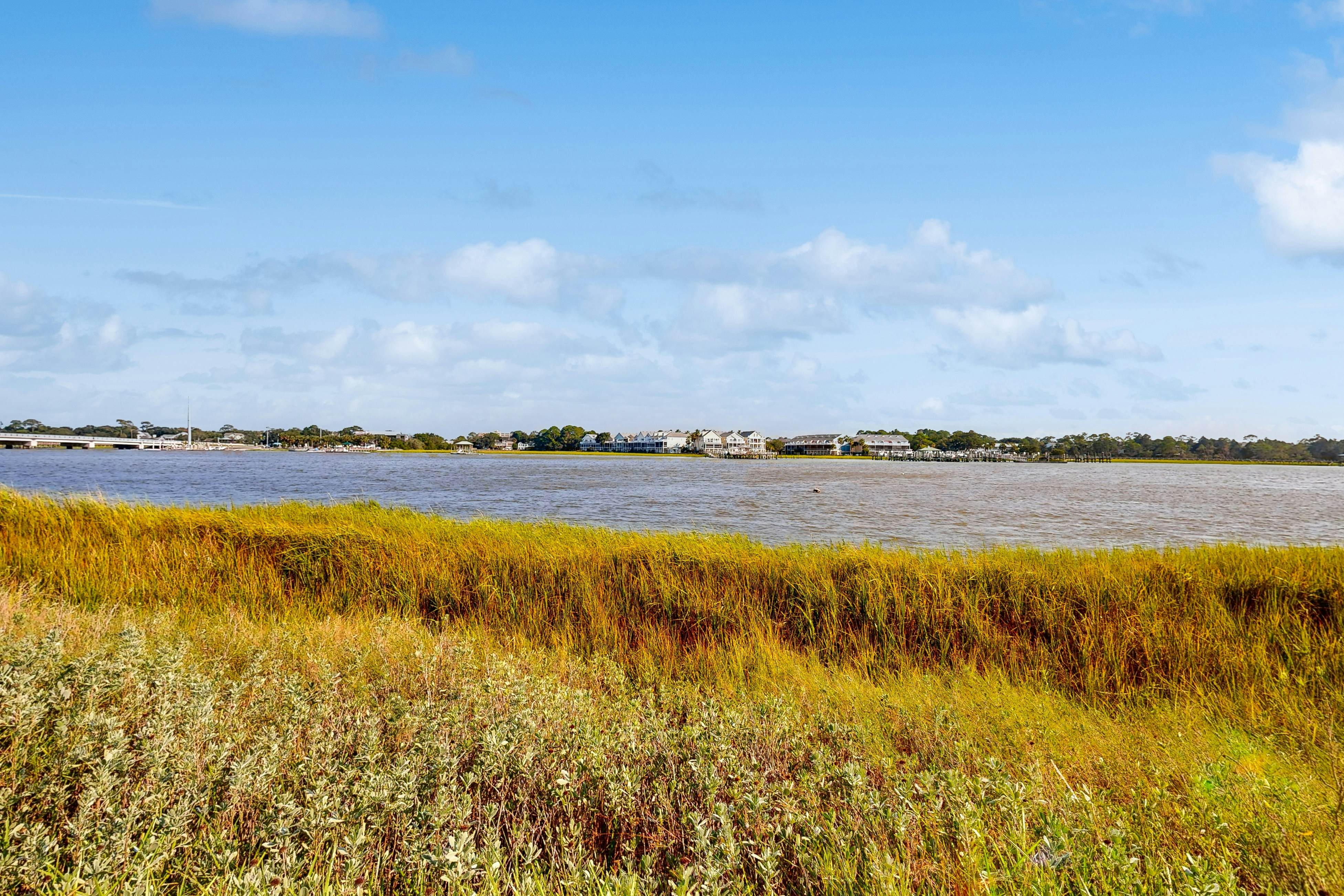 Elegant riverfront condo with access to private W/D, central AC, and pool access