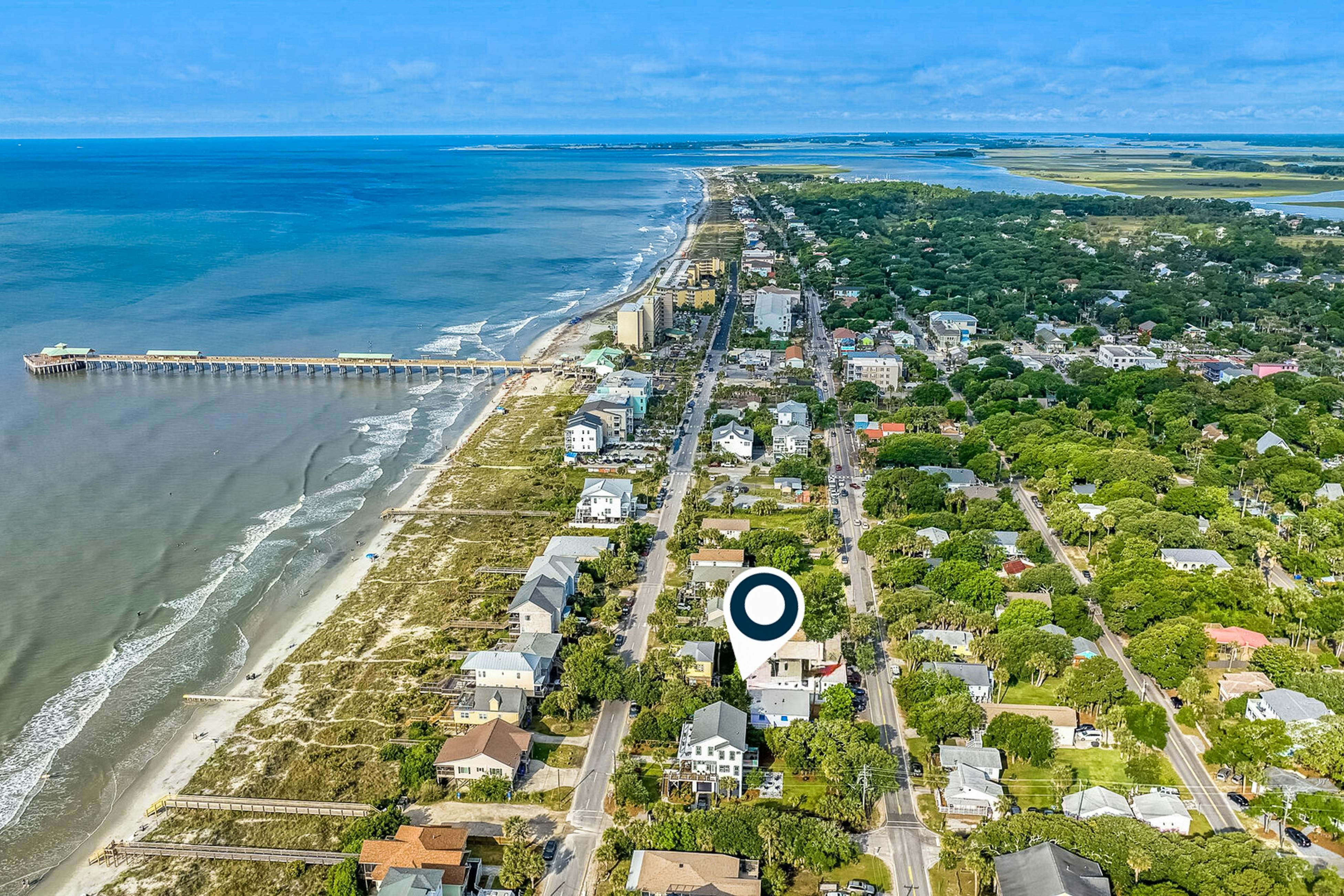 Coastal dog-friendly home with pool, ocean views & fenced yard