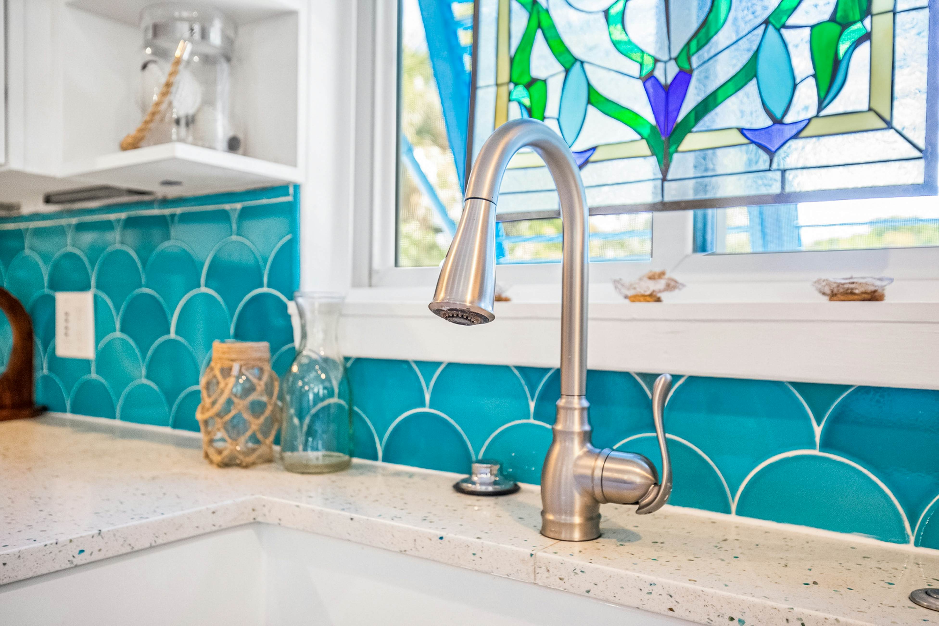 Coastal dog-friendly home with pool, ocean views & fenced yard