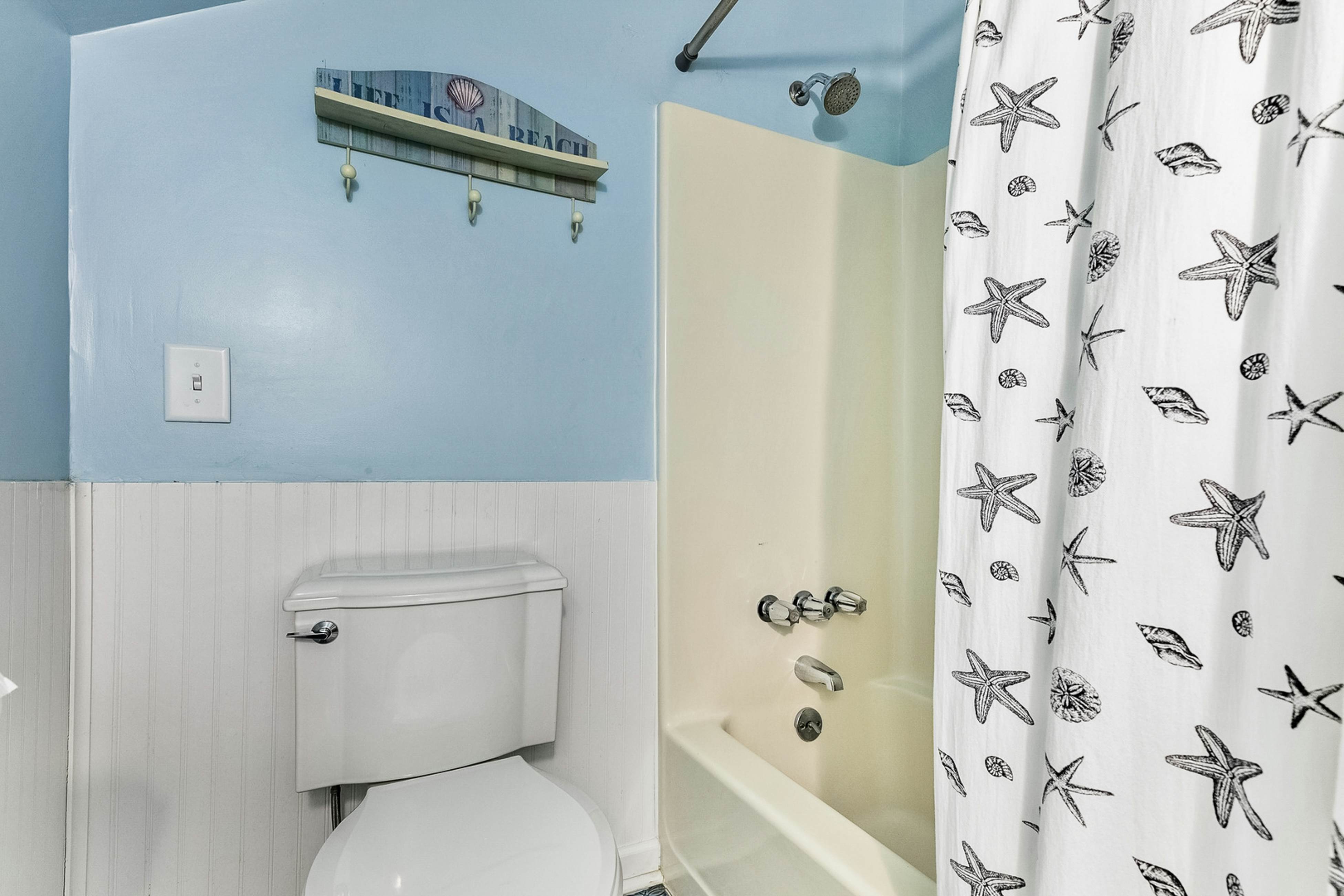 Coastal dog-friendly home with pool, ocean views & fenced yard