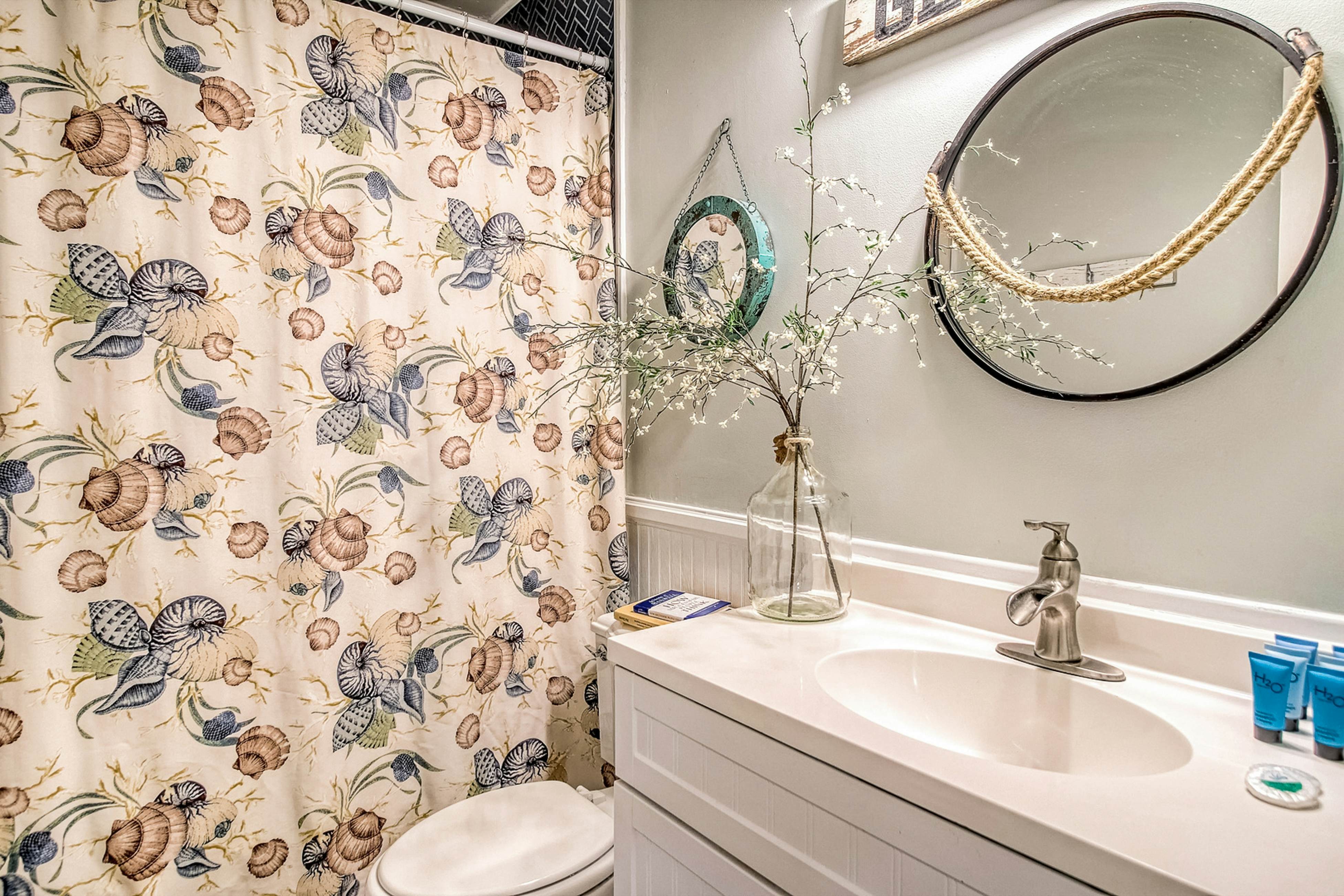 Coastal dog-friendly home with pool, ocean views & fenced yard