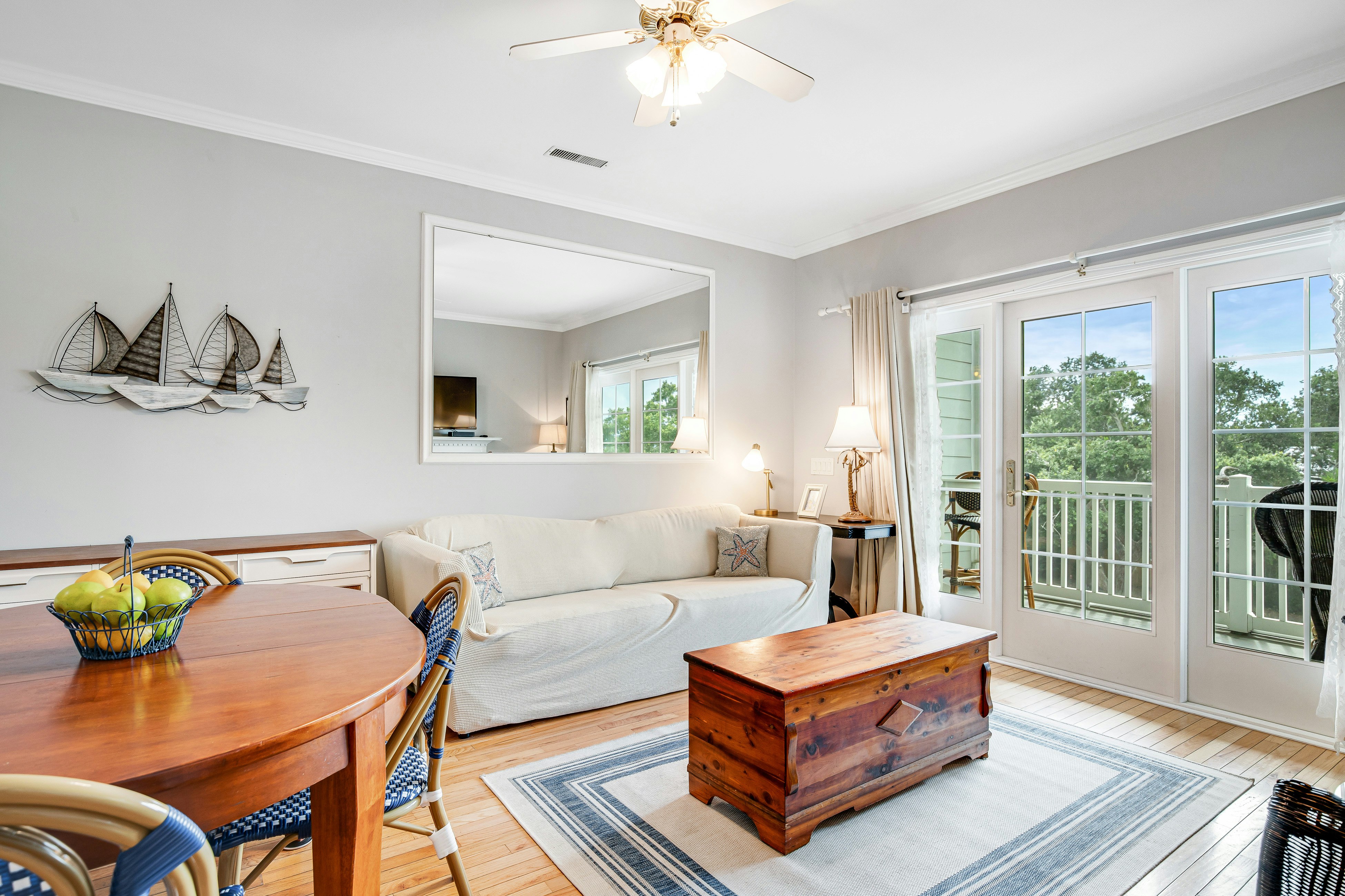 2nd-floor retreat with screened porch, shared pool, WiFi, central AC & elevator