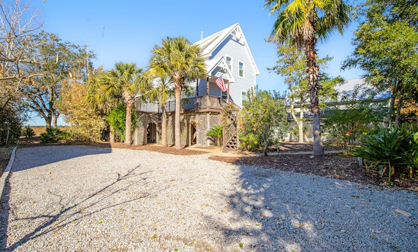 Gorgeous home with marsh views, deck, firepit & gourmet kitchen
