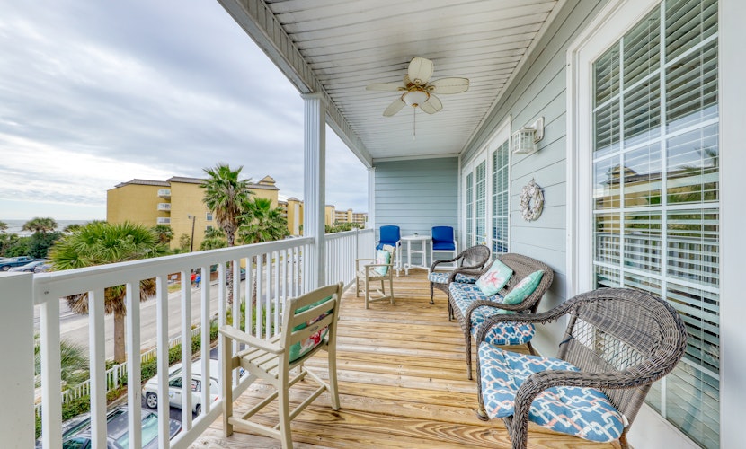 Second-level beachfront villa w/ shared pool, ocean views, & balcony