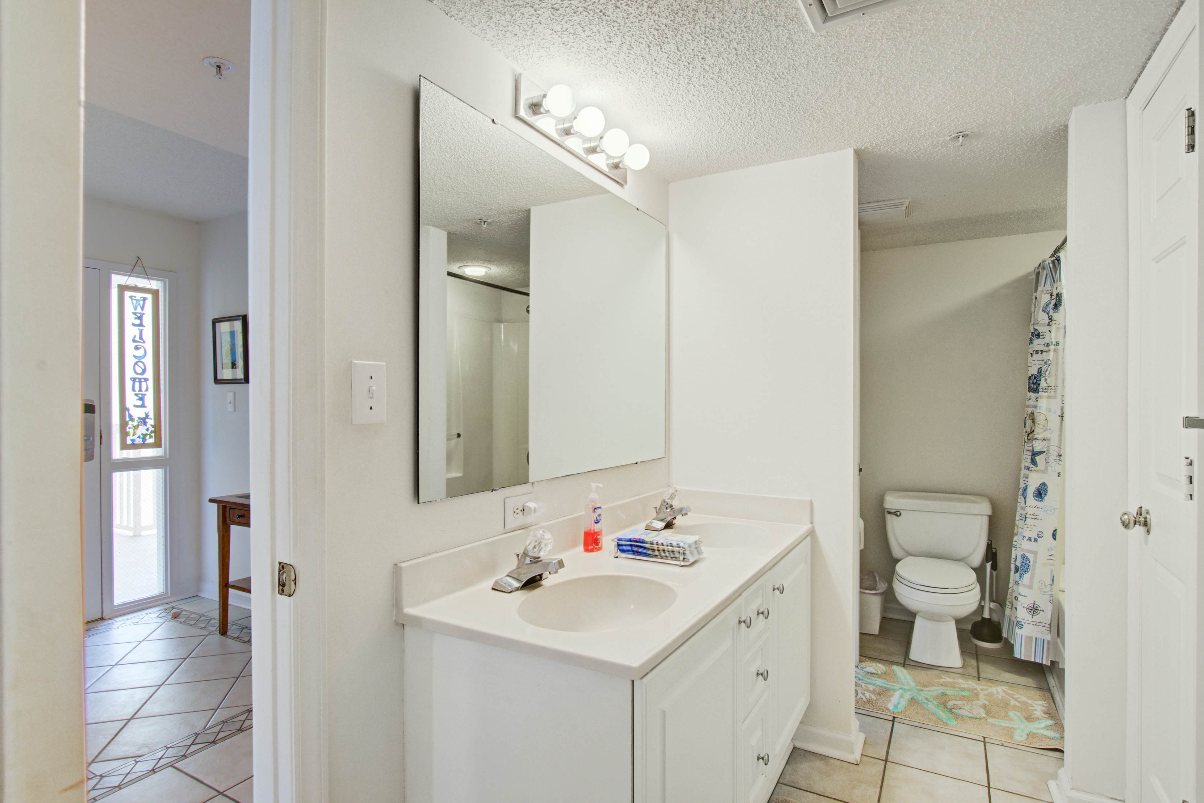 Oceanfront, third-floor villa with large private balcony and shared pools