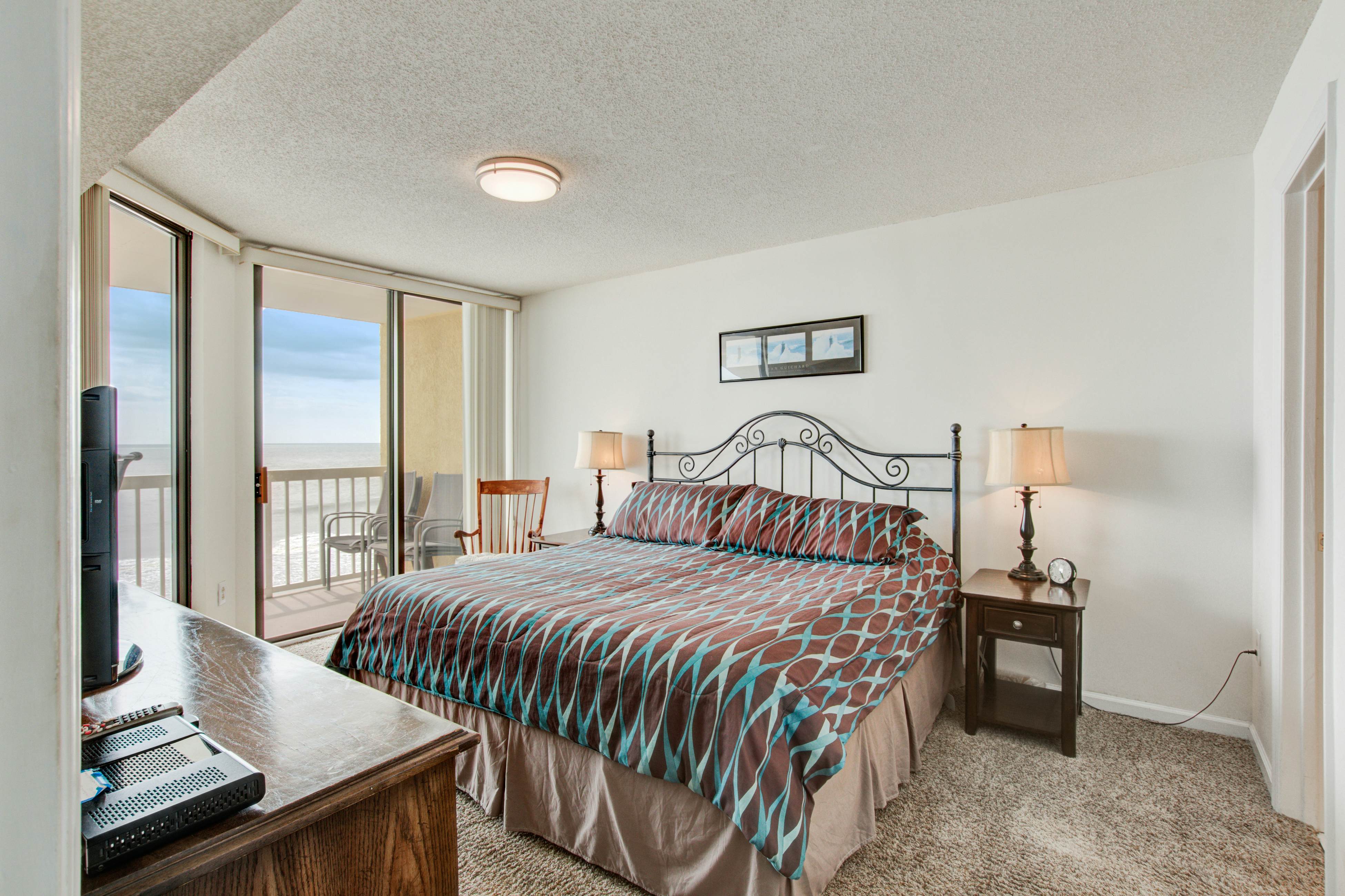 Oceanfront, third-floor villa with large private balcony and shared pools