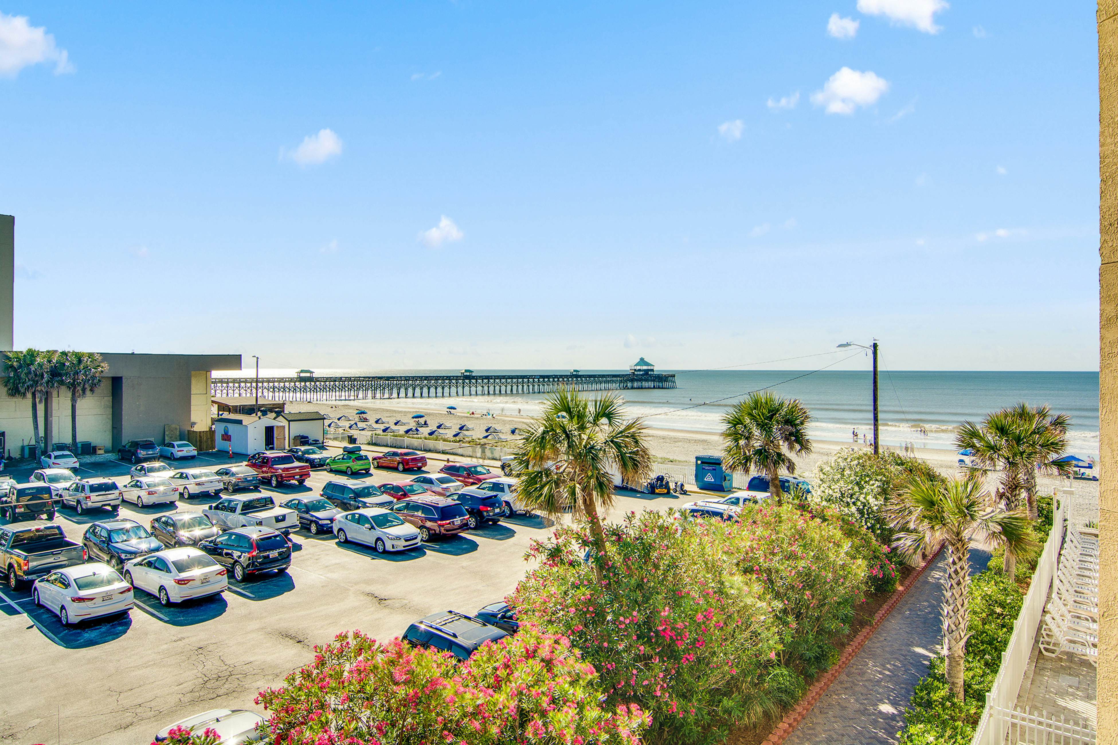 Oceanfront, third-floor villa with large private balcony and shared pools