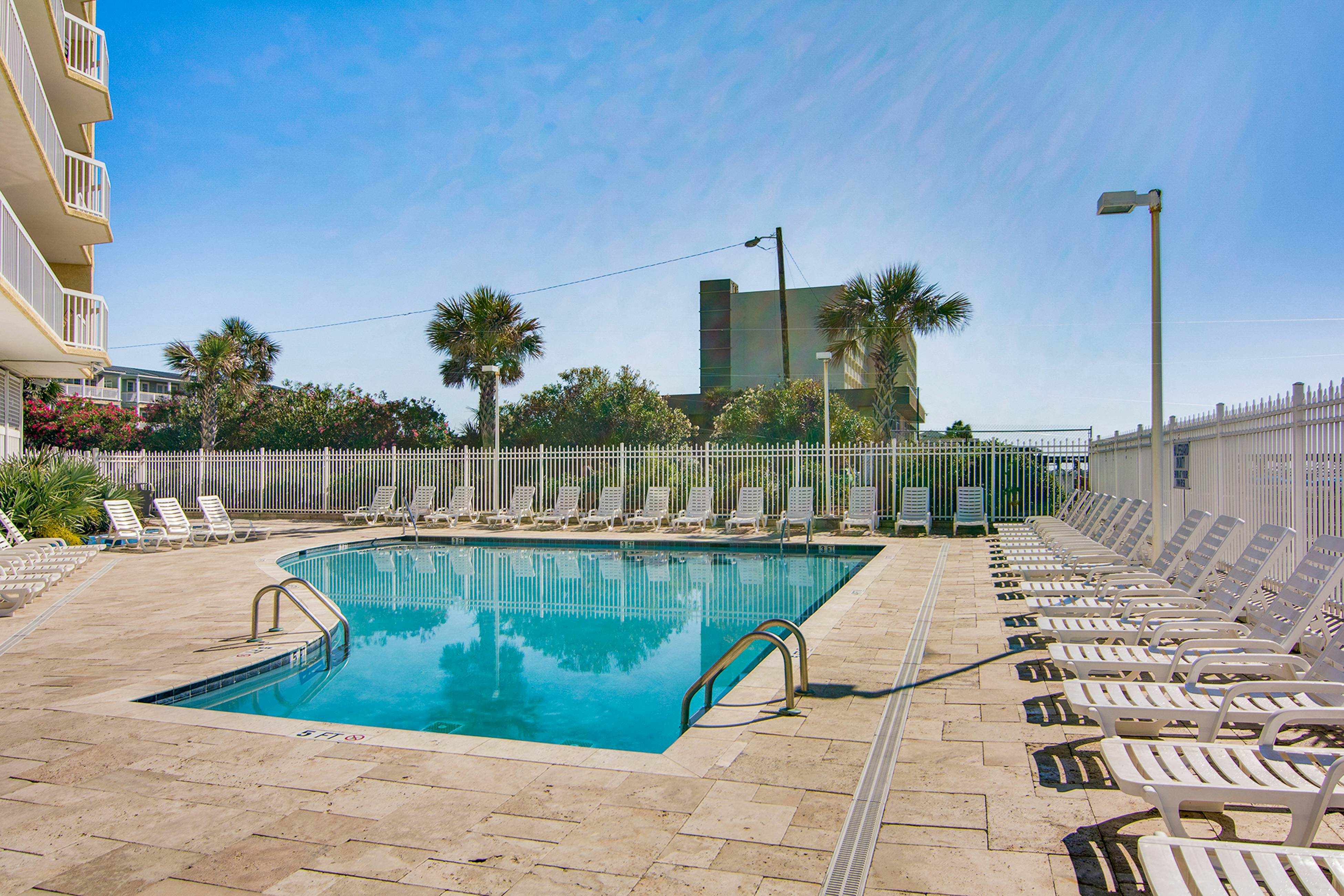 Oceanfront, third-floor villa with large private balcony and shared pools