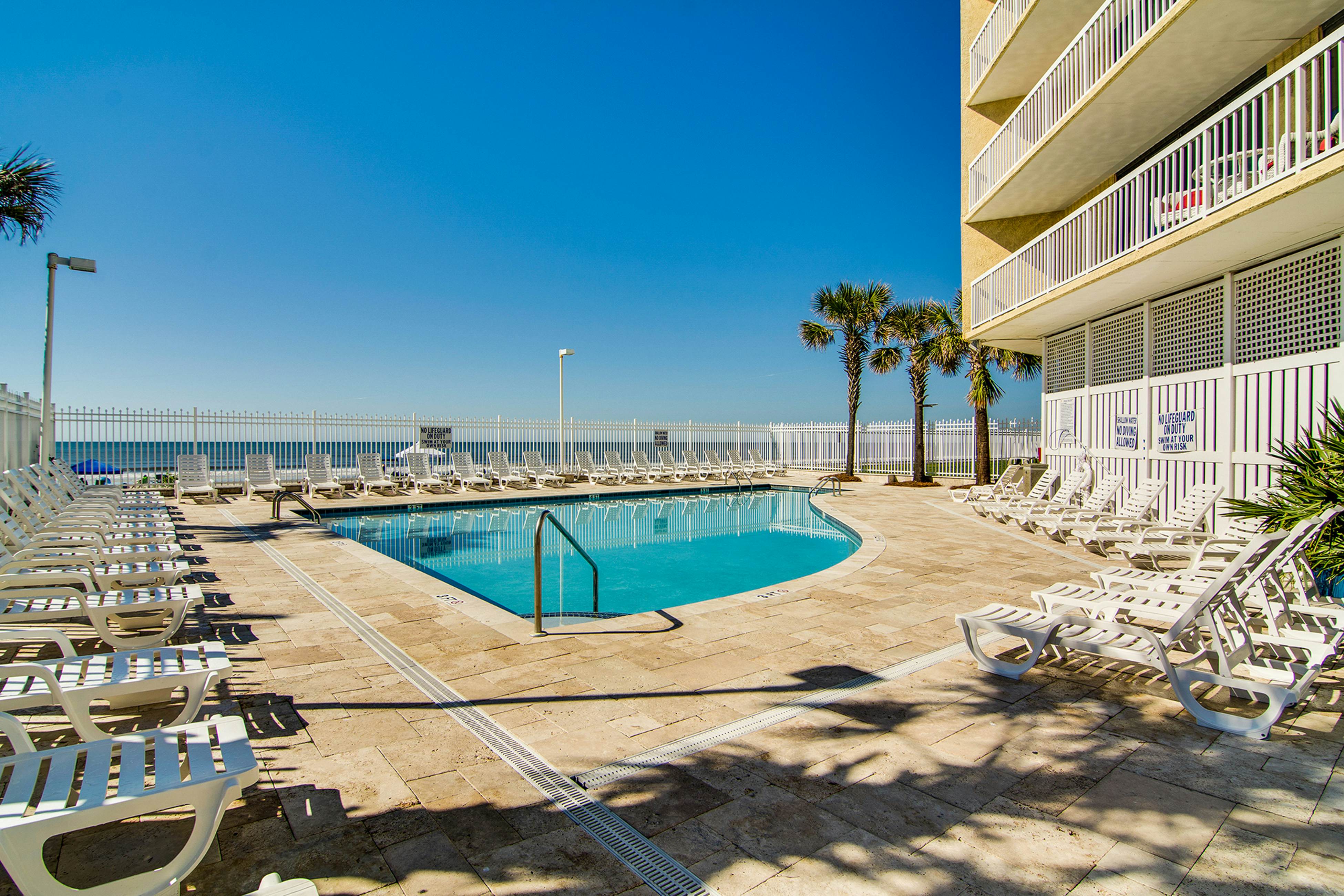 Oceanfront, third-floor villa with large private balcony and shared pools