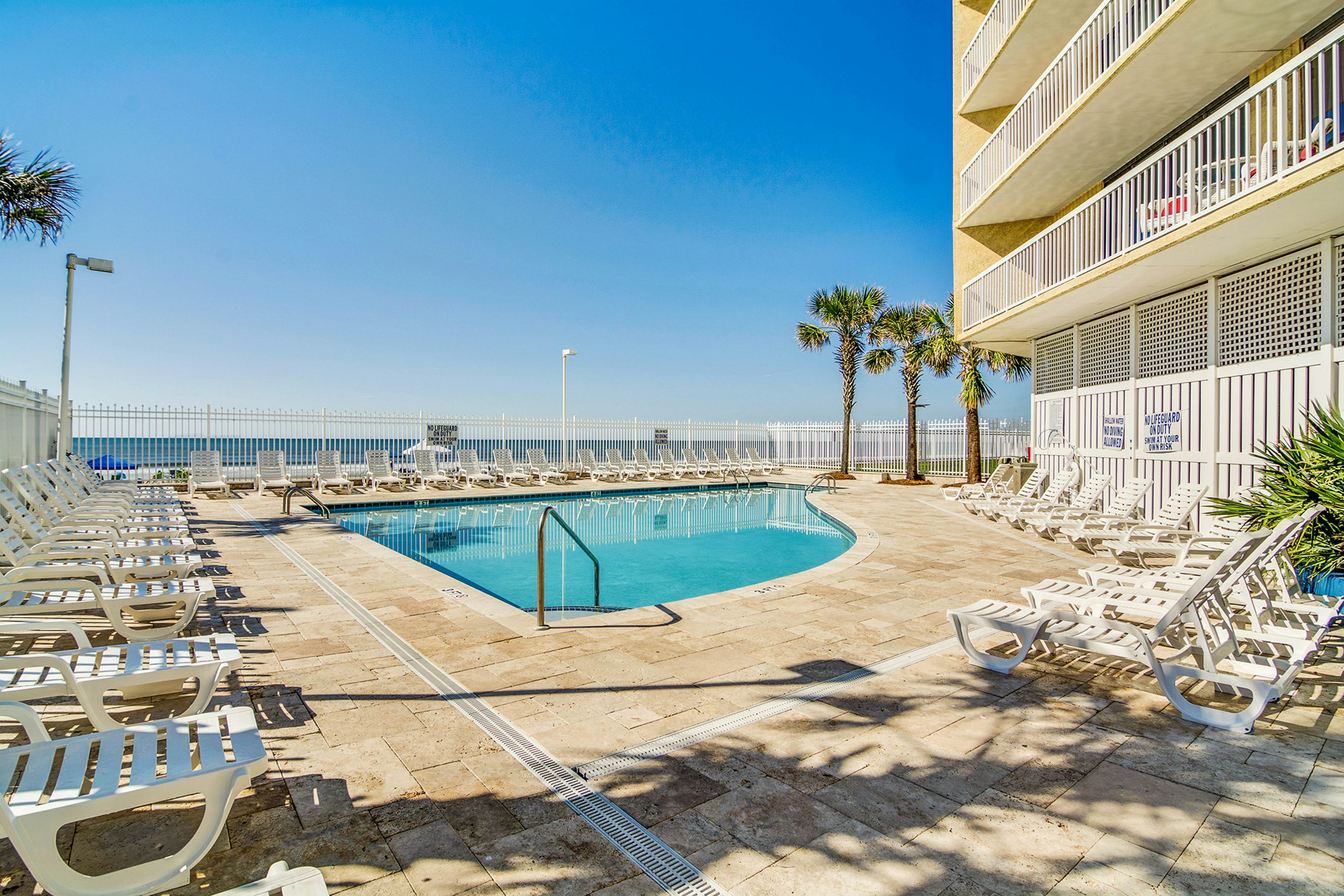 Oceanfront, third-floor villa with great views, balcony & 2 shared pools