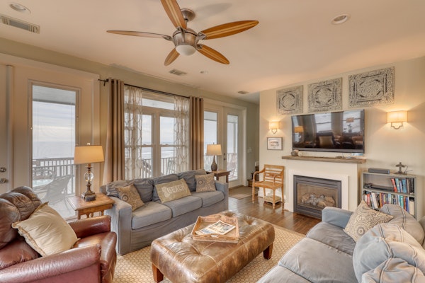 Raised oceanfront home with elevator & outdoor shower just steps from beach