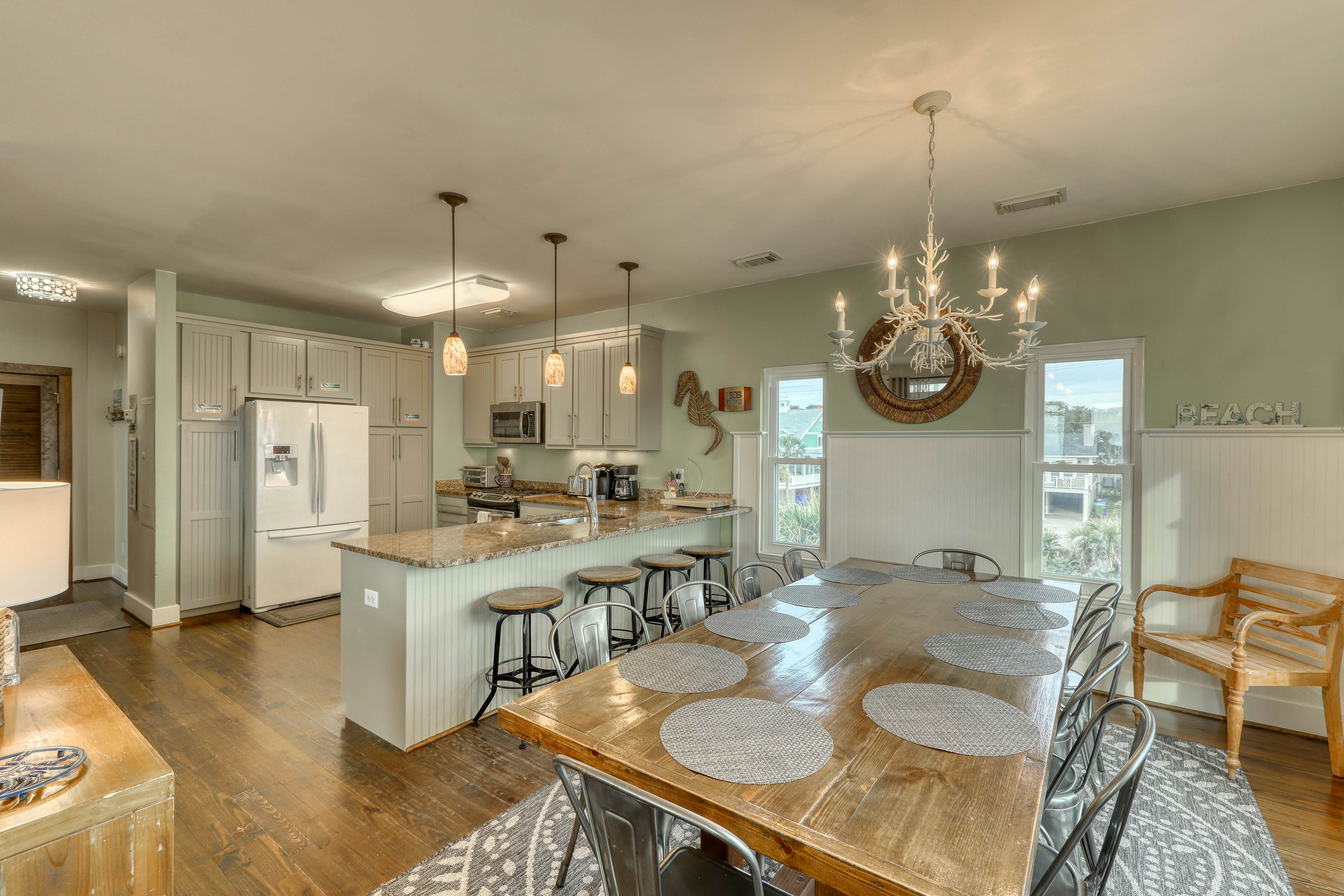 Raised oceanfront home with elevator & outdoor shower just steps from beach