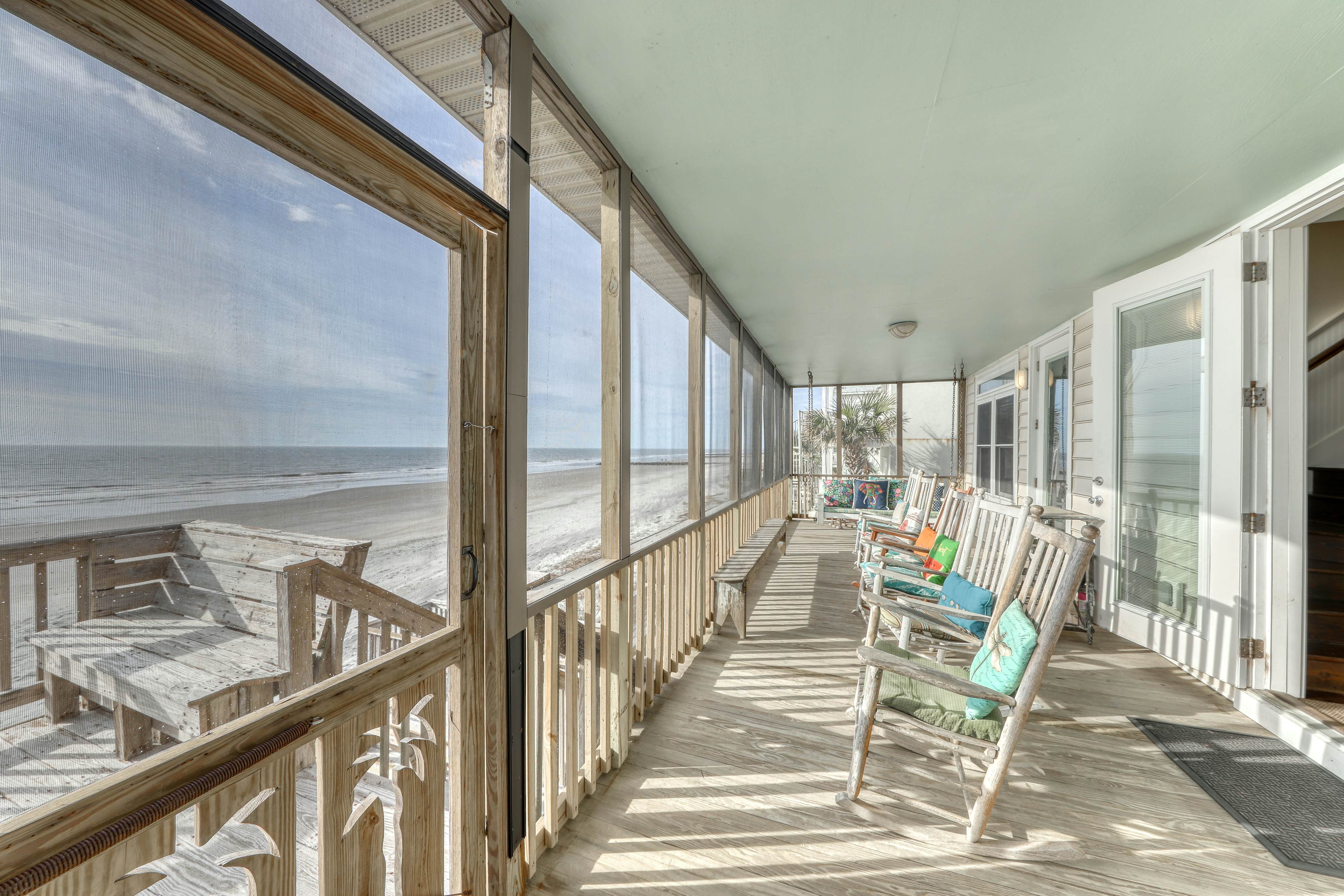 Raised oceanfront home with elevator & outdoor shower just steps from beach